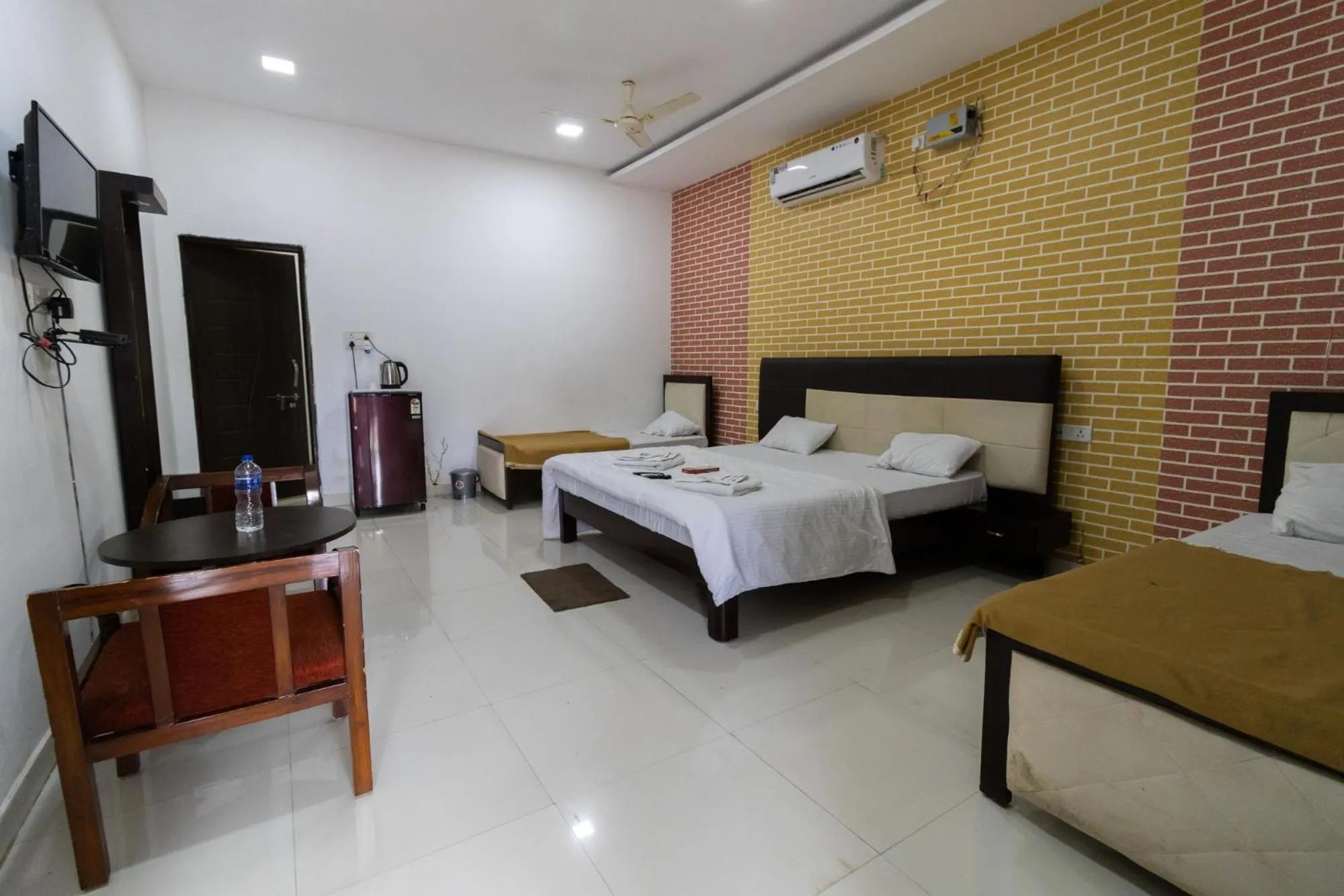 Photo of the whole room, Bed in Vrindavan Gopala Resort