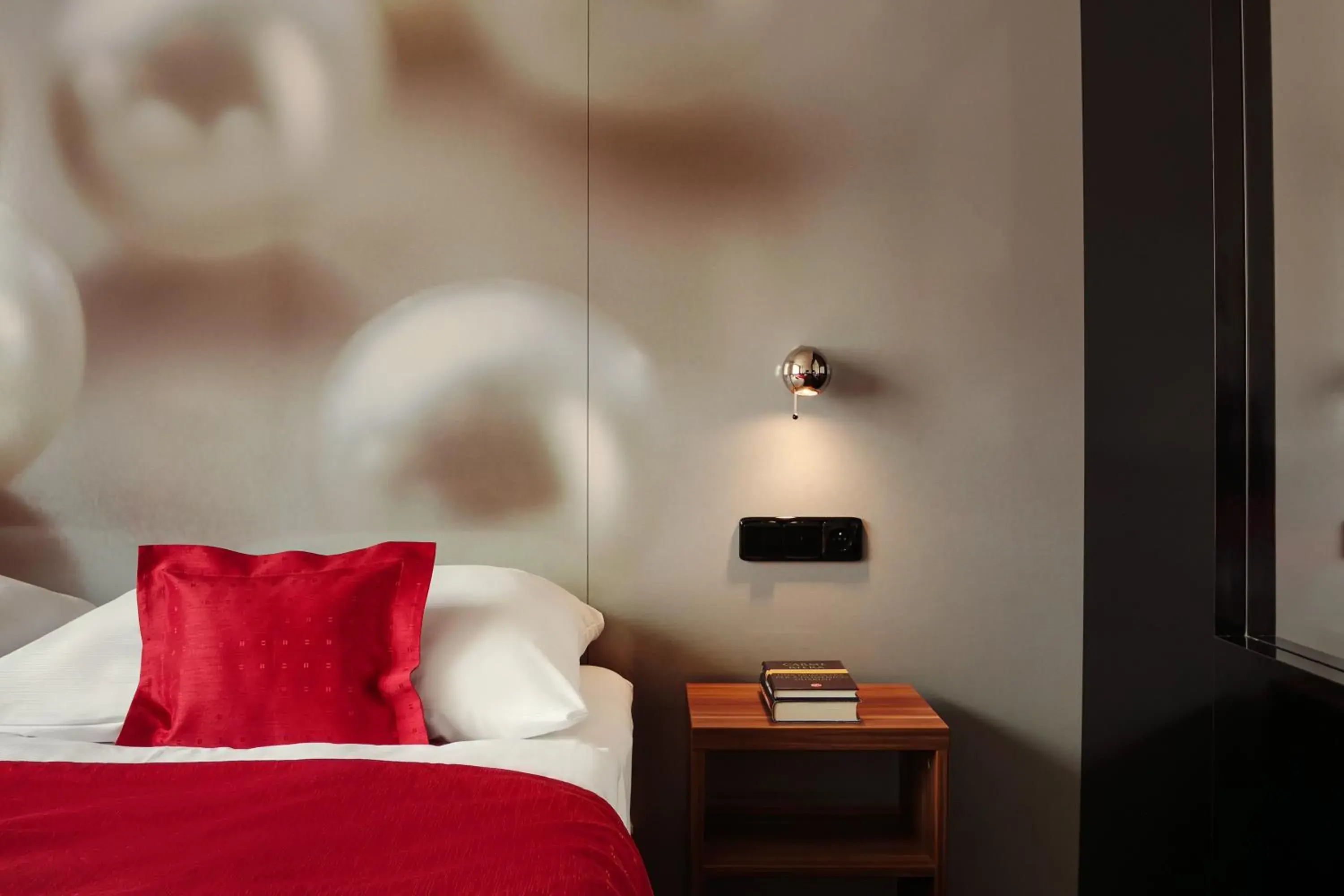 Bed in Perla Hotel Bed in Perla Hotel