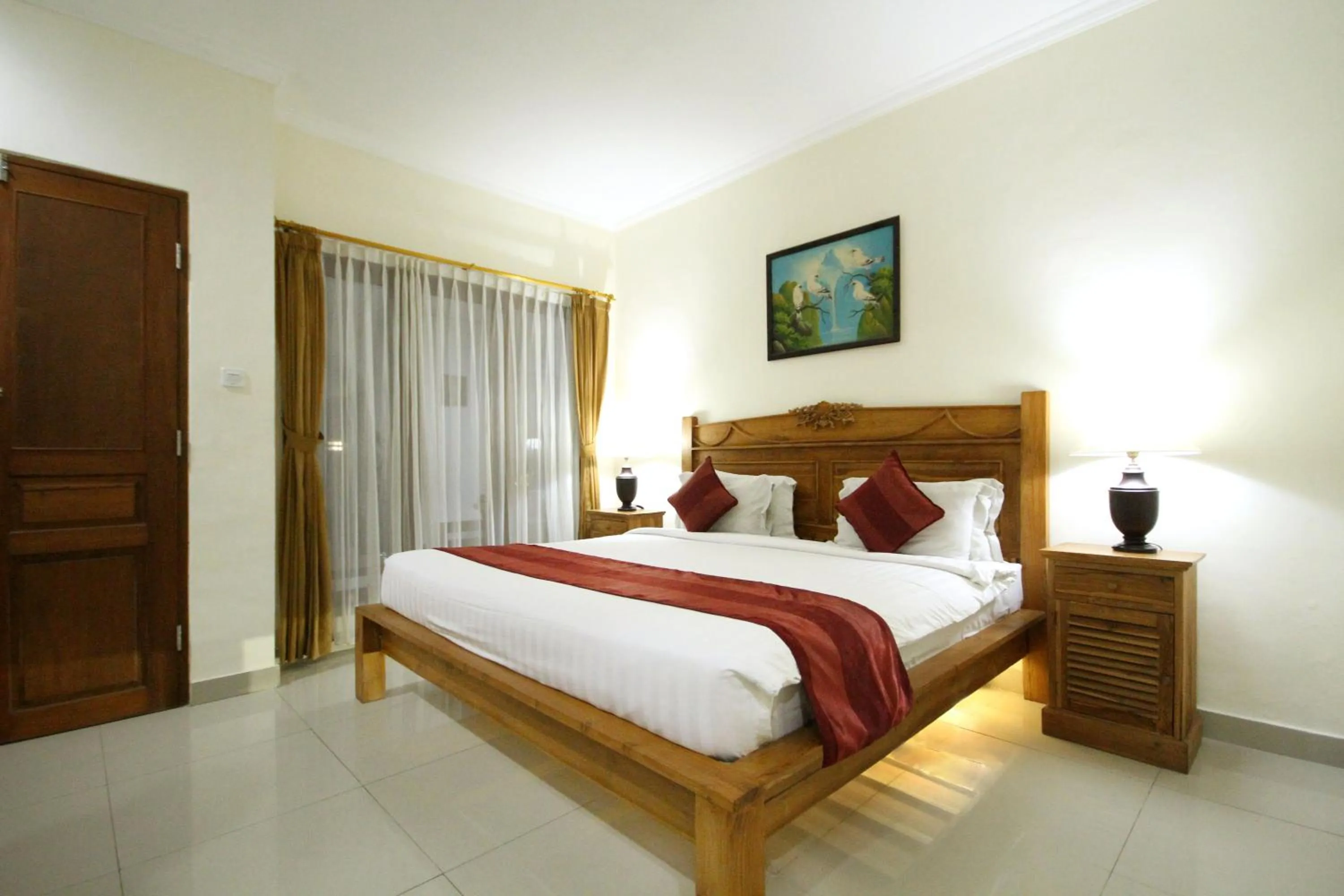 Bed in Swastika Guesthouse Sanur