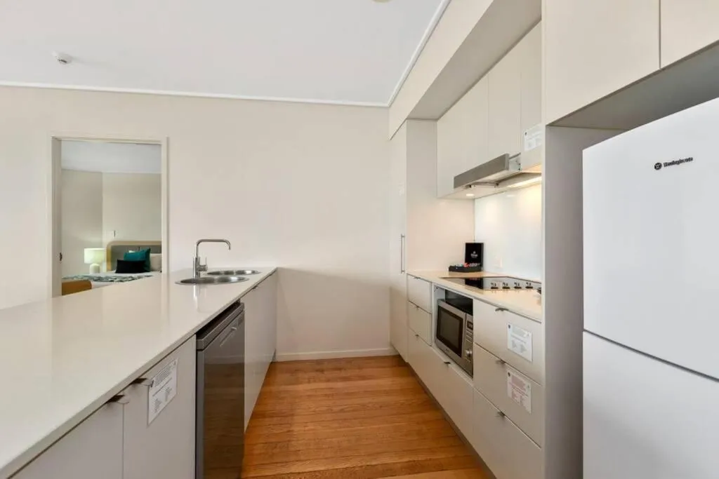 Kitchen or kitchenette in The Sand Resort Kingscliff - Holiday Management Co.