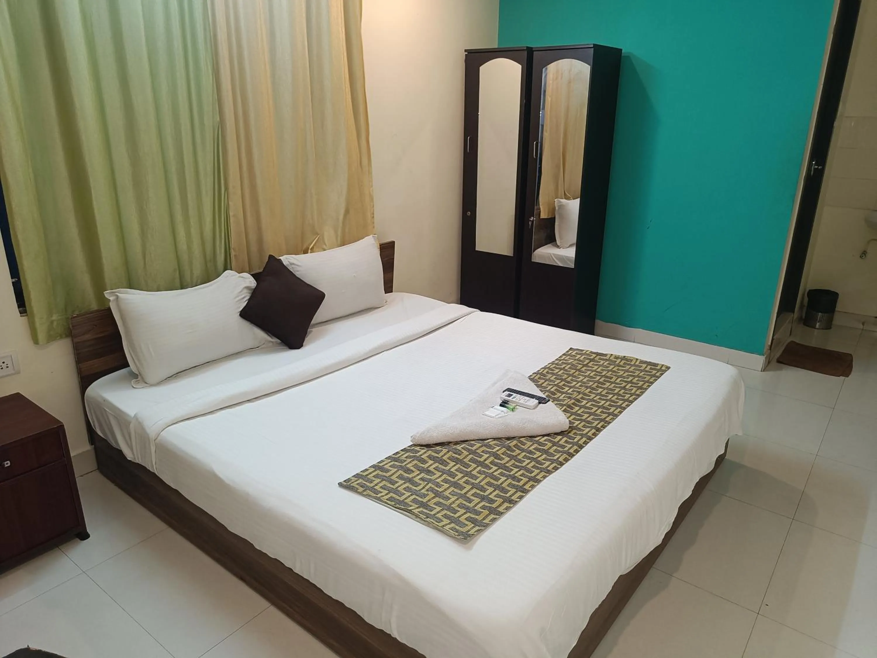 Deluxe Double Room - single occupancy in Green Tree Hotel-Near VFS Global and Ramee Mall
