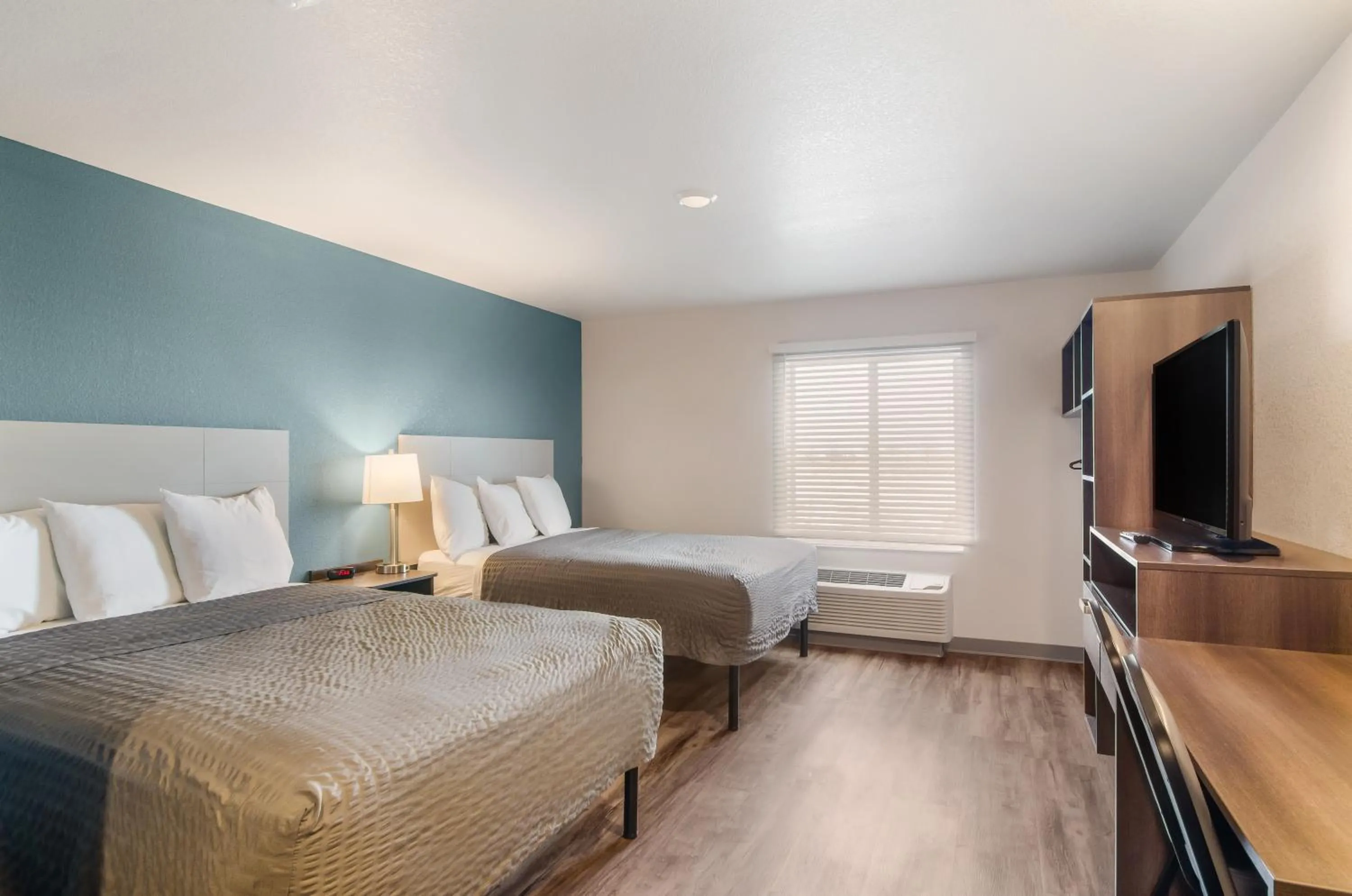 Photo of the whole room, Bed in WoodSpring Suites Thornton-North Denver