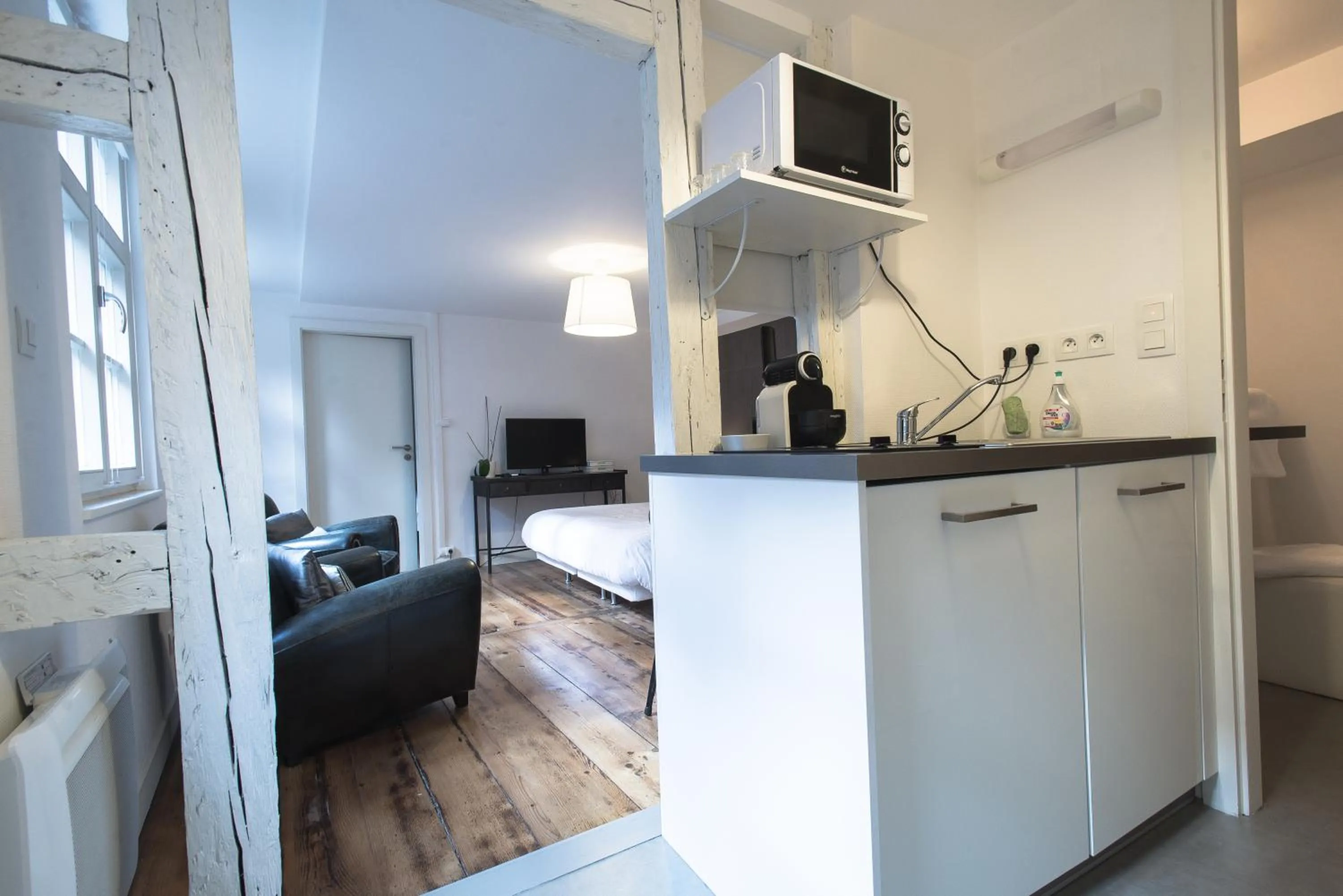 Kitchen or kitchenette in Appartements Orfèvres Cathédrale