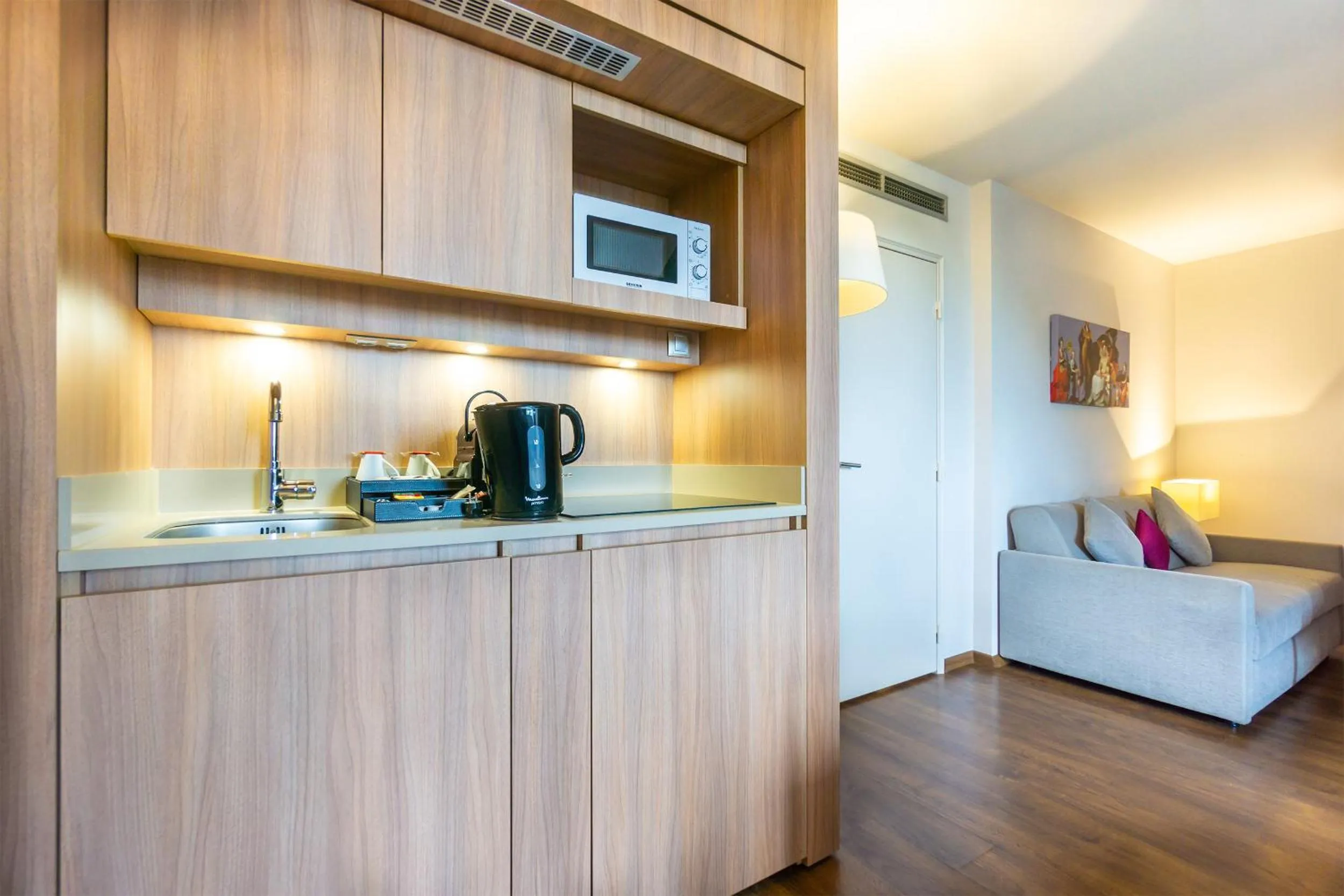 Kitchen or kitchenette in City Résidence Paris CDG Airport