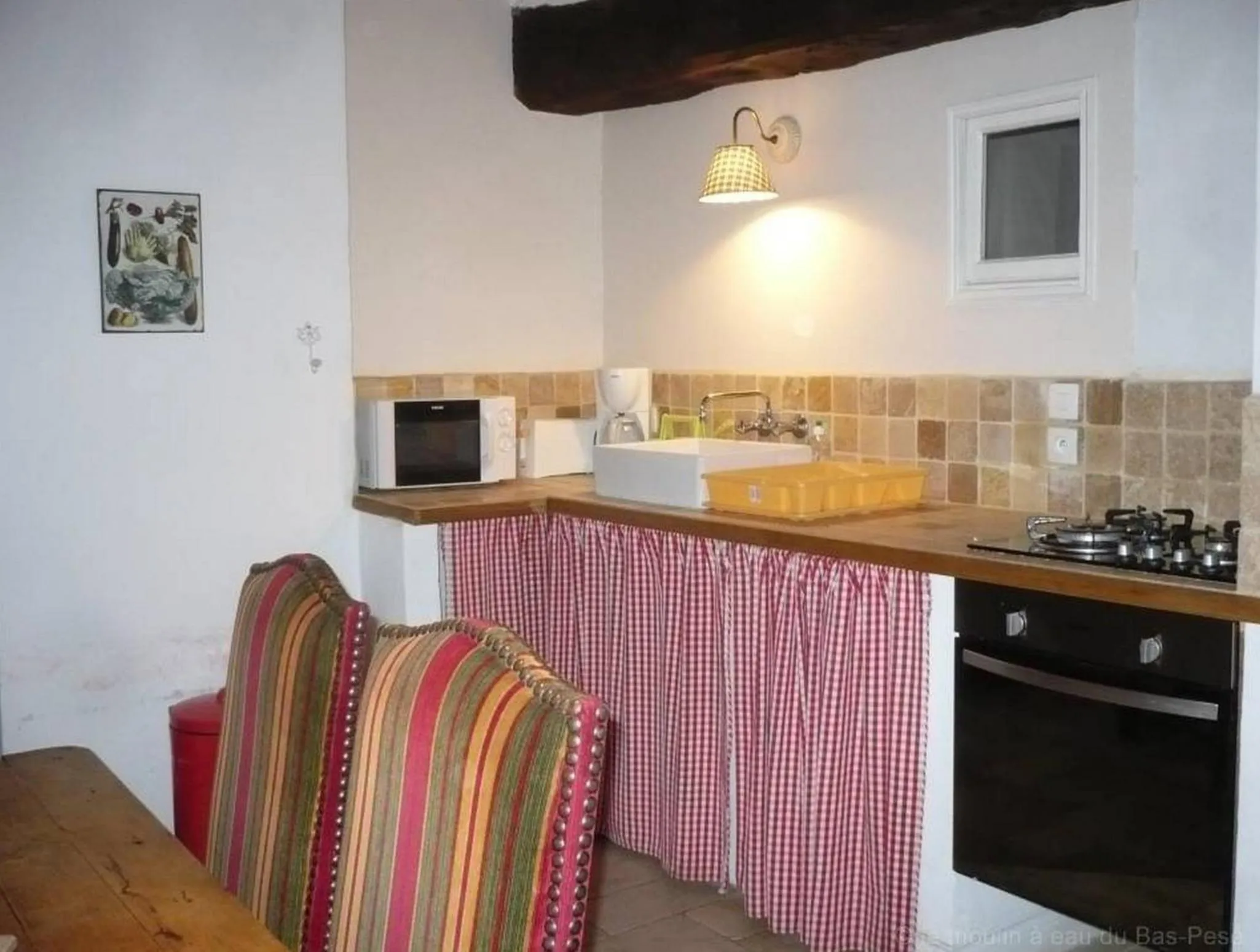 Kitchen or kitchenette in Maison d'hôtes Moulin du Bas Pesé