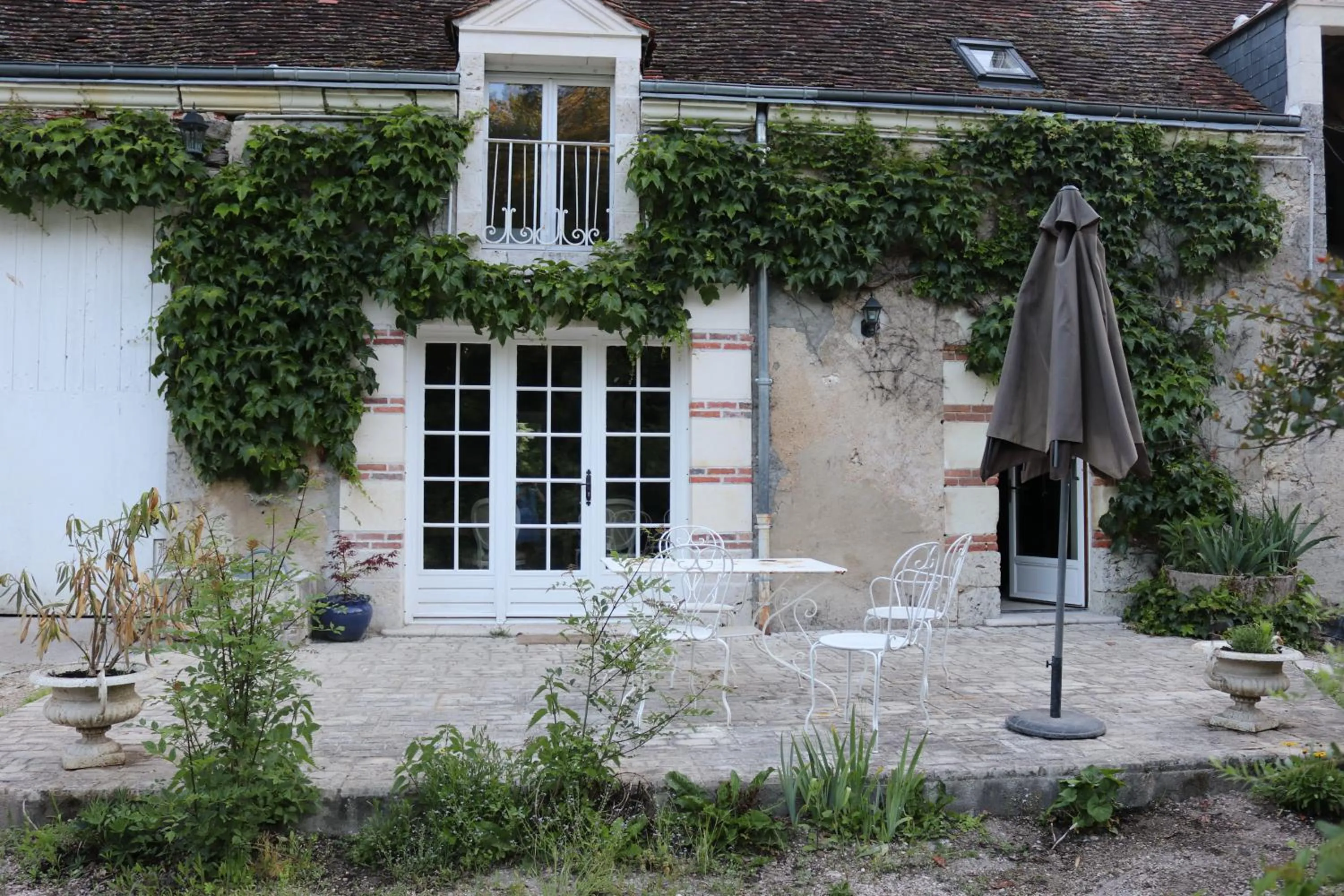 Garden view in Maison d'hôtes Moulin du Bas Pesé