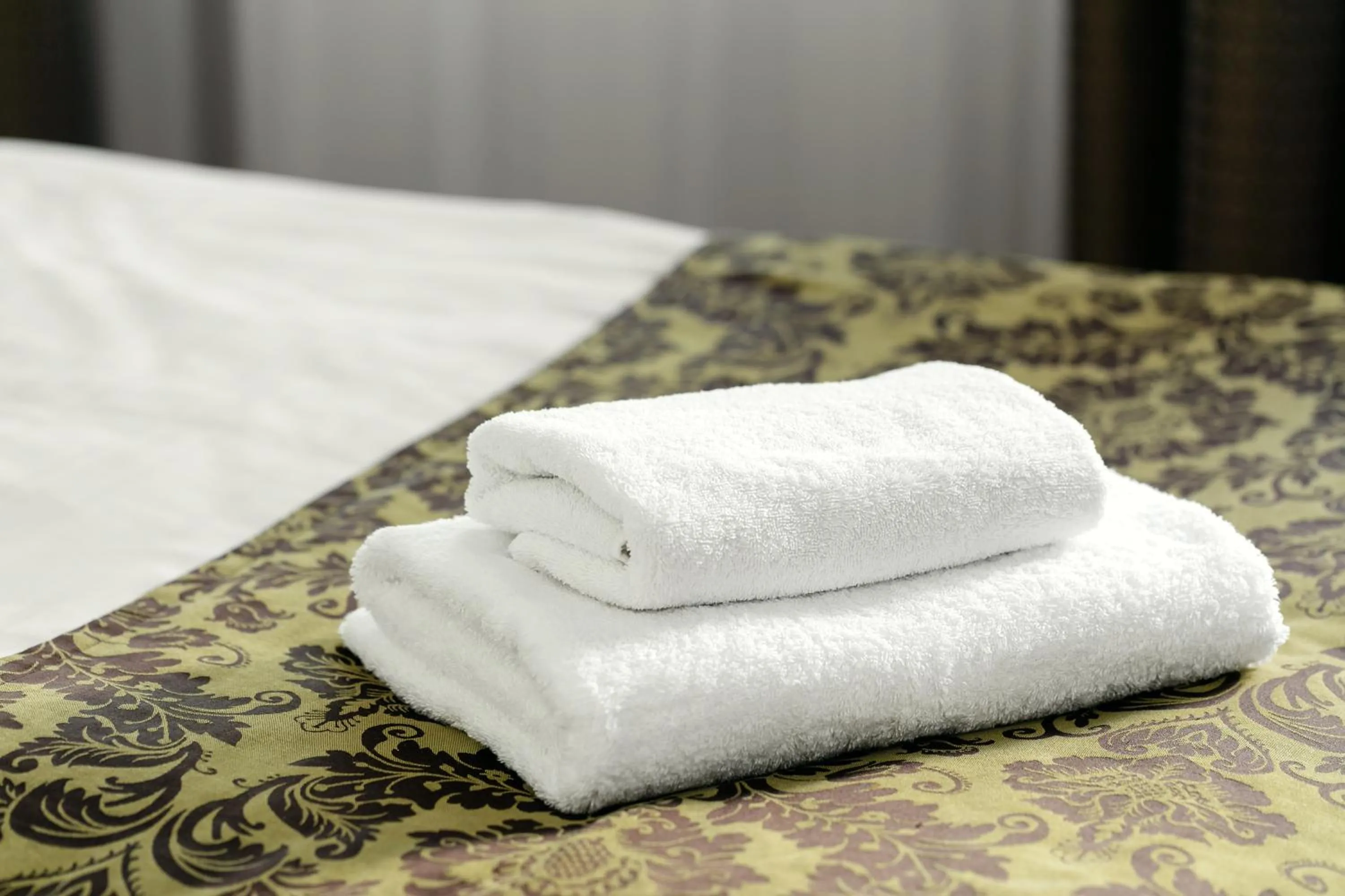 towels, Bed in Hotel Superior Prague