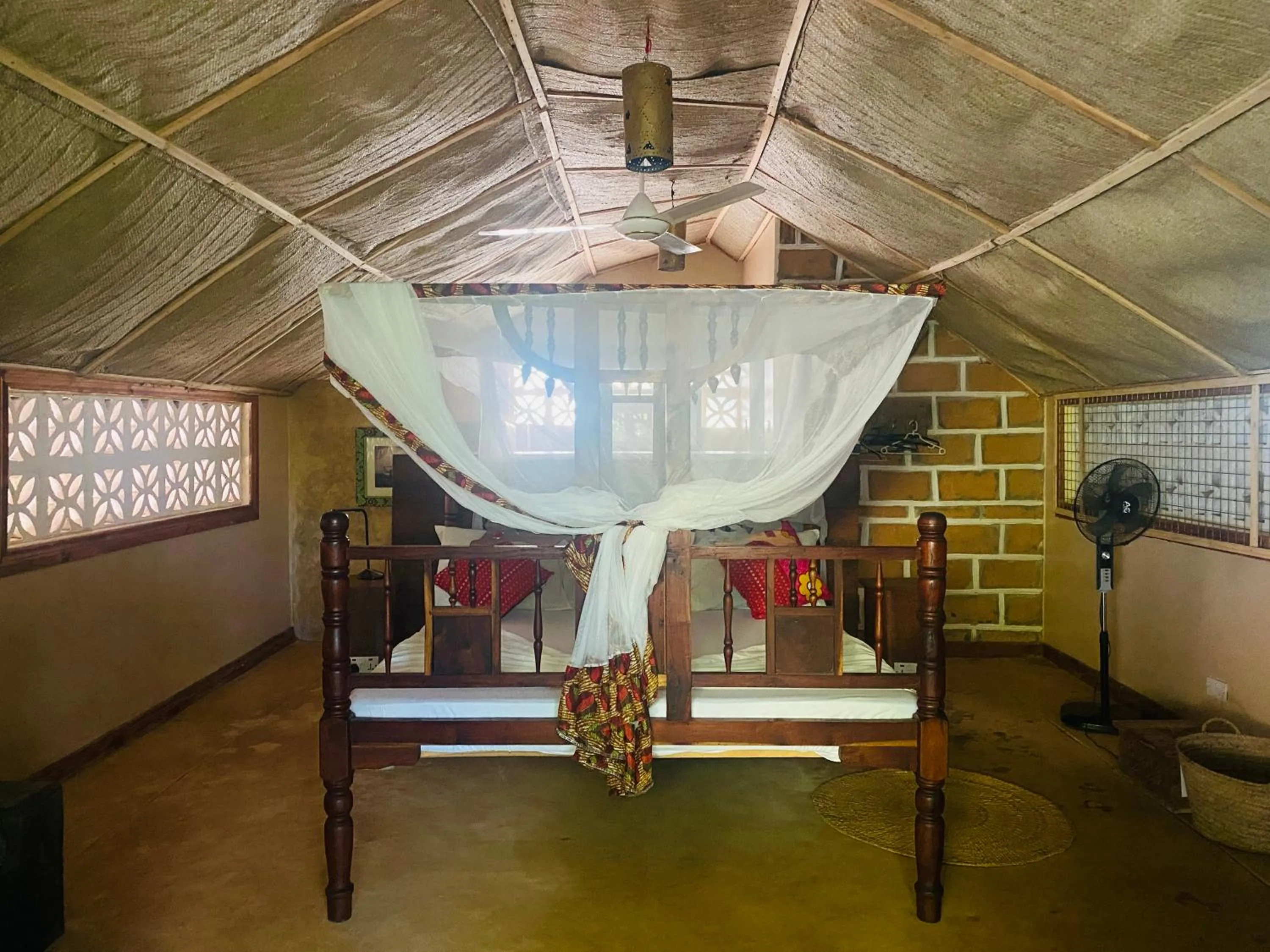 Bed in Mbuyuni Beach Village