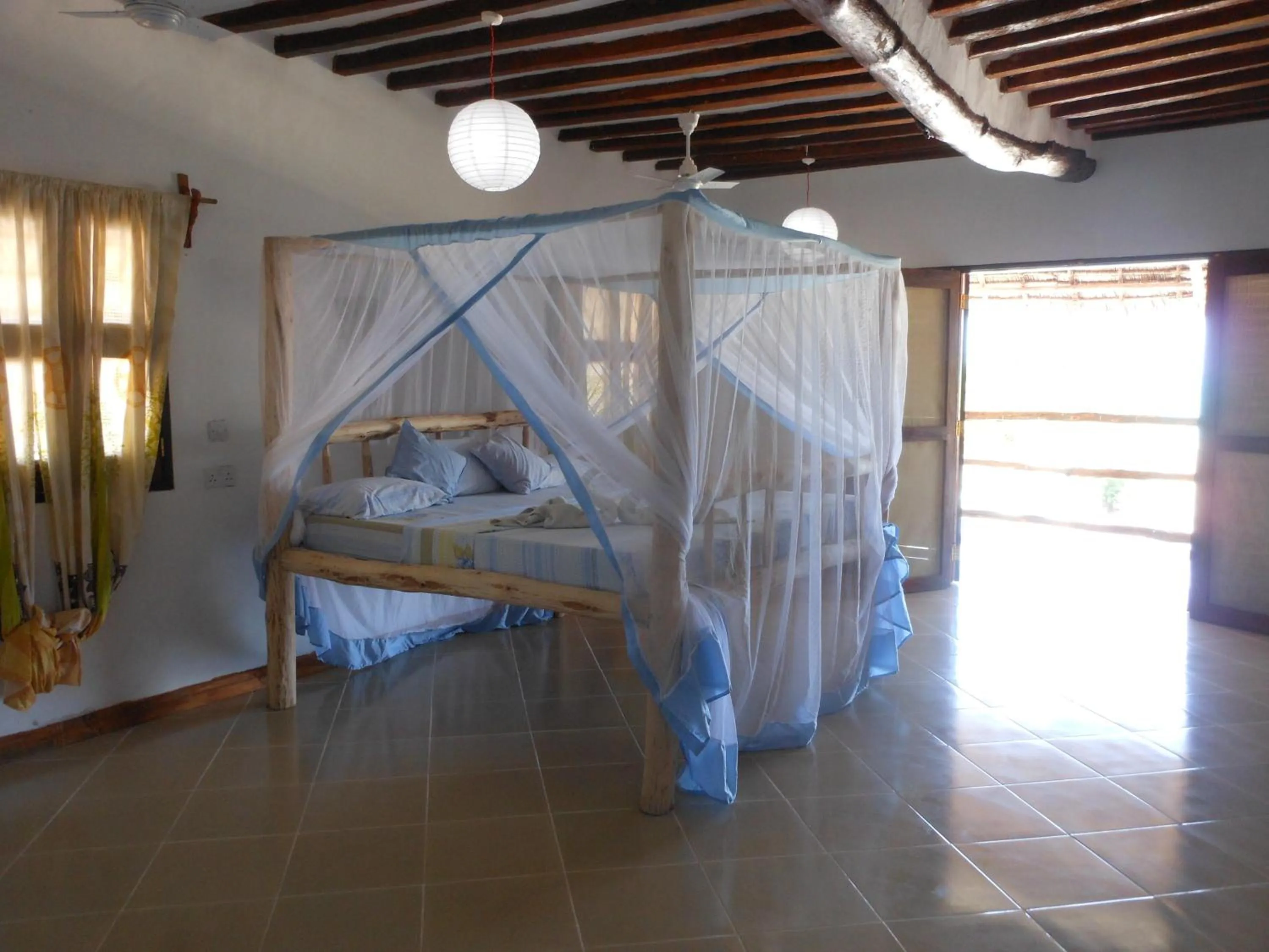 Bed in Mbuyuni Beach Village