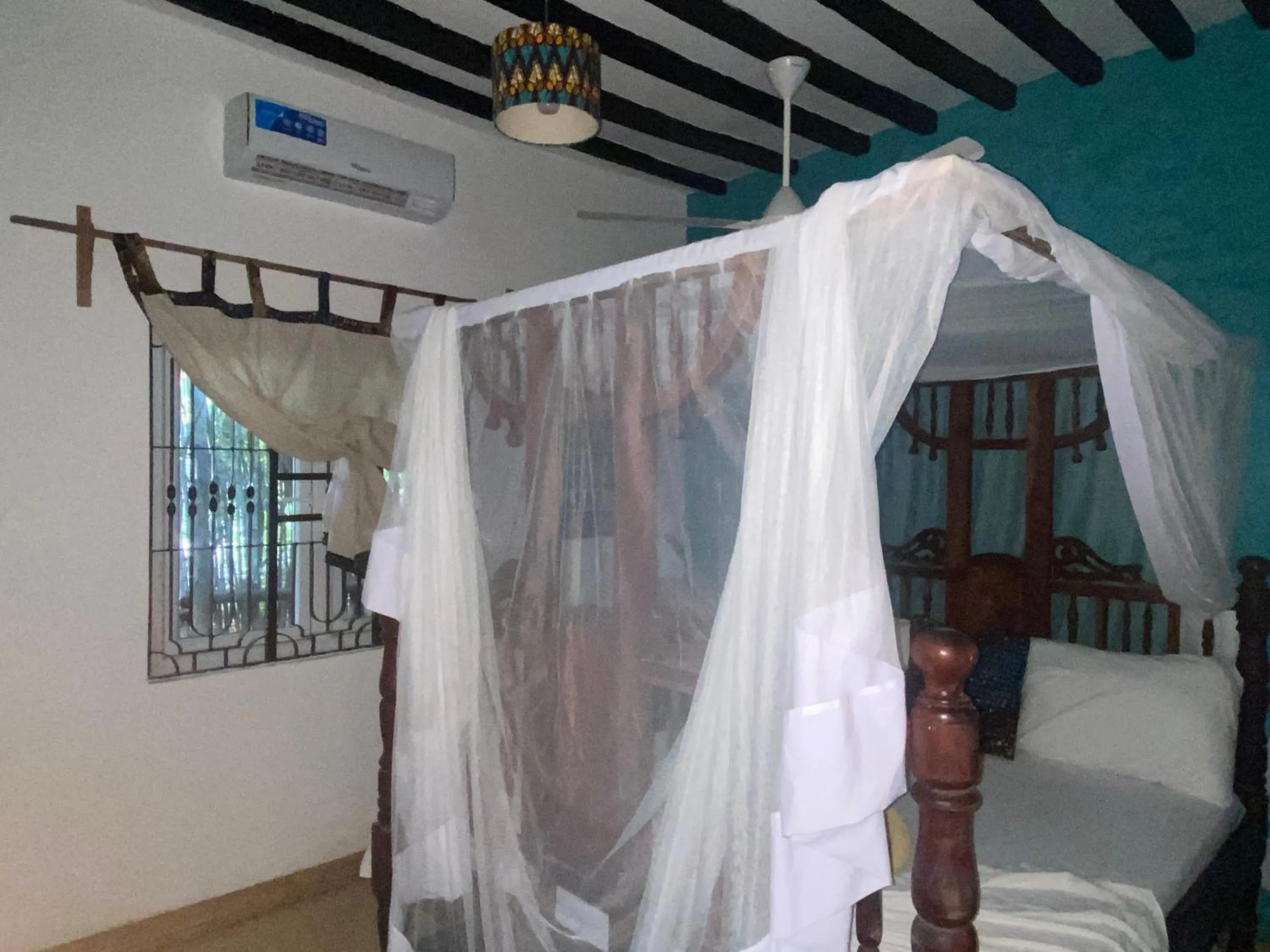 Bed in Mbuyuni Beach Village