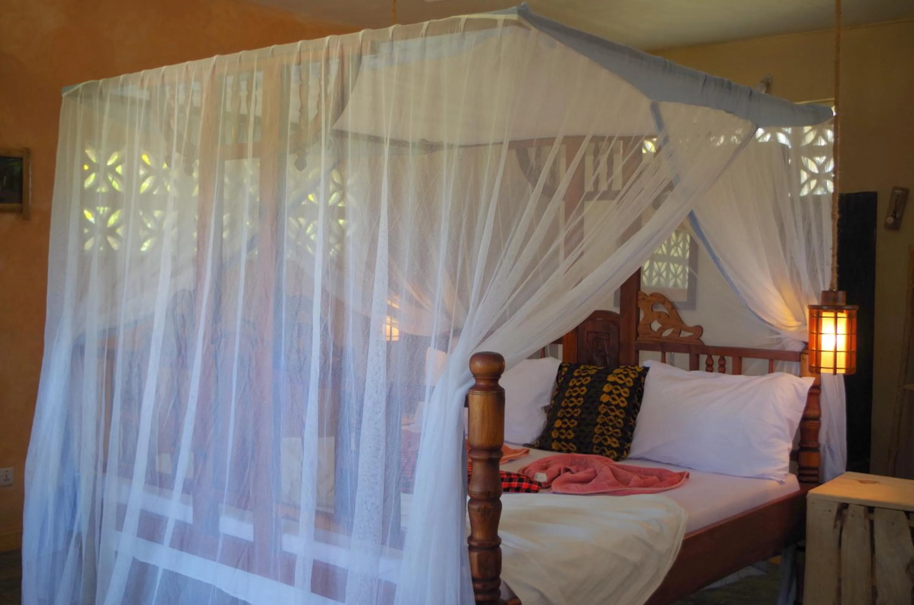Bed in Mbuyuni Beach Village
