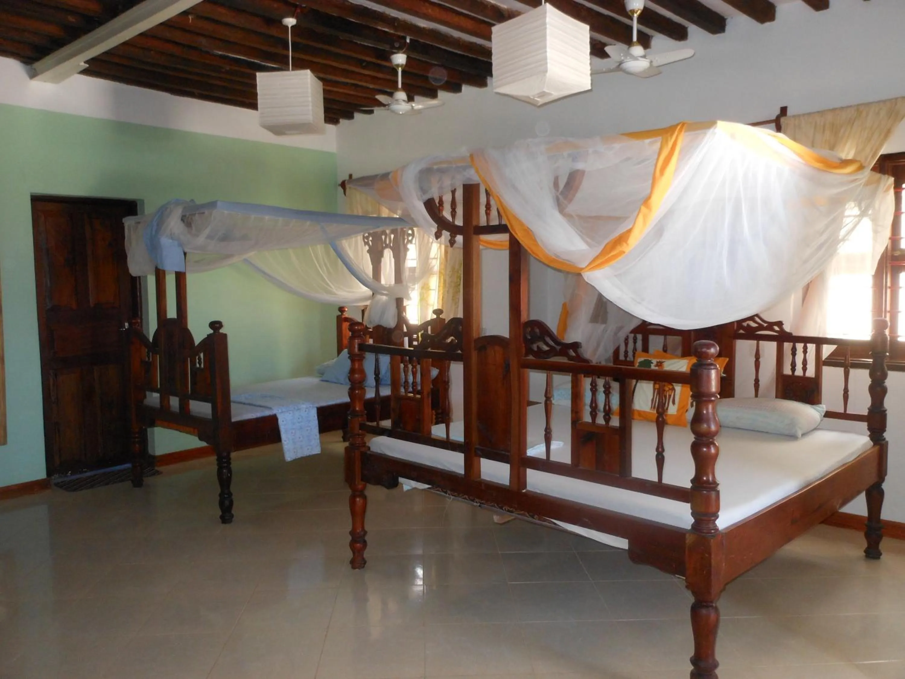 Bed in Mbuyuni Beach Village