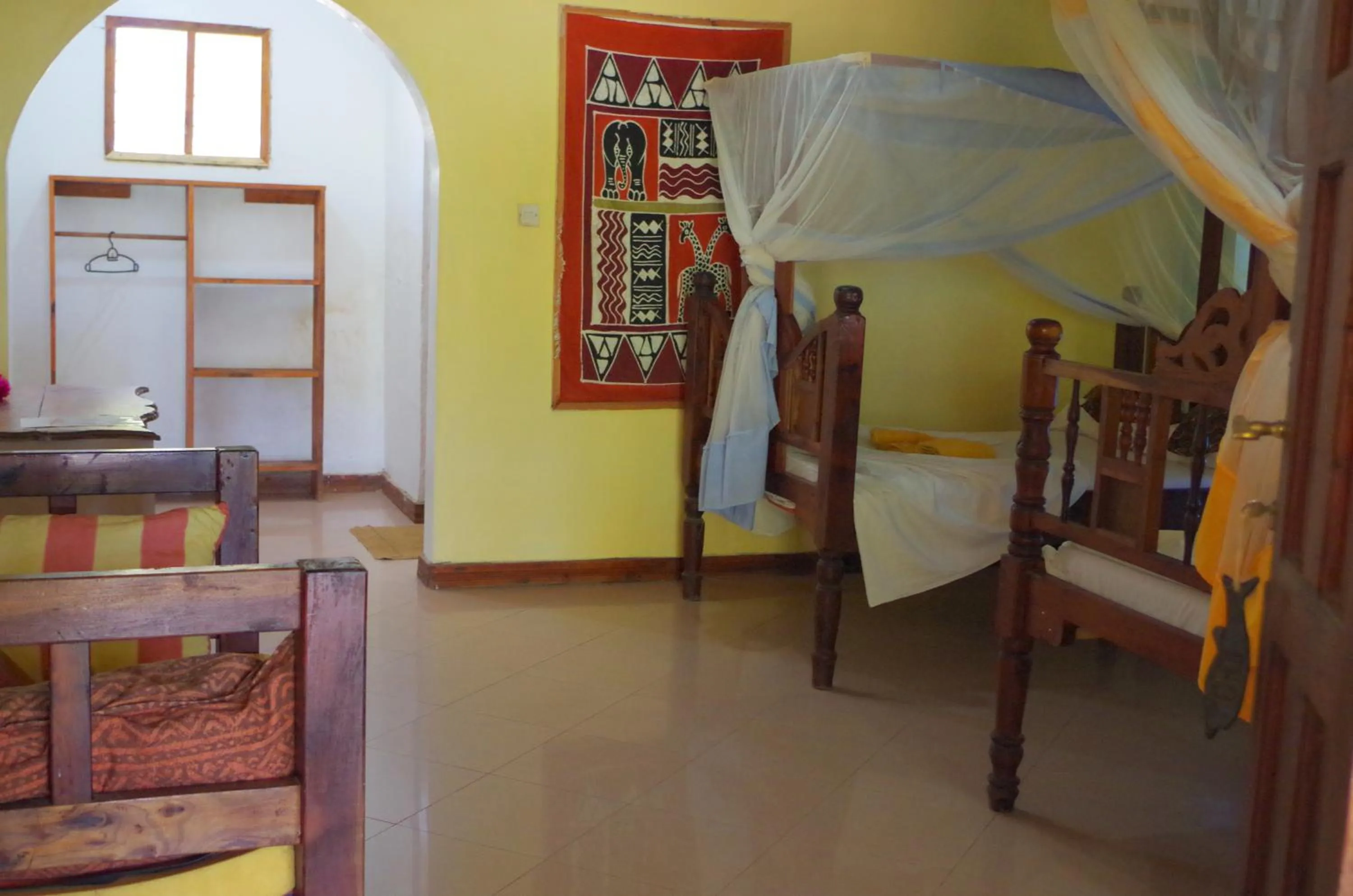 Bed in Mbuyuni Beach Village