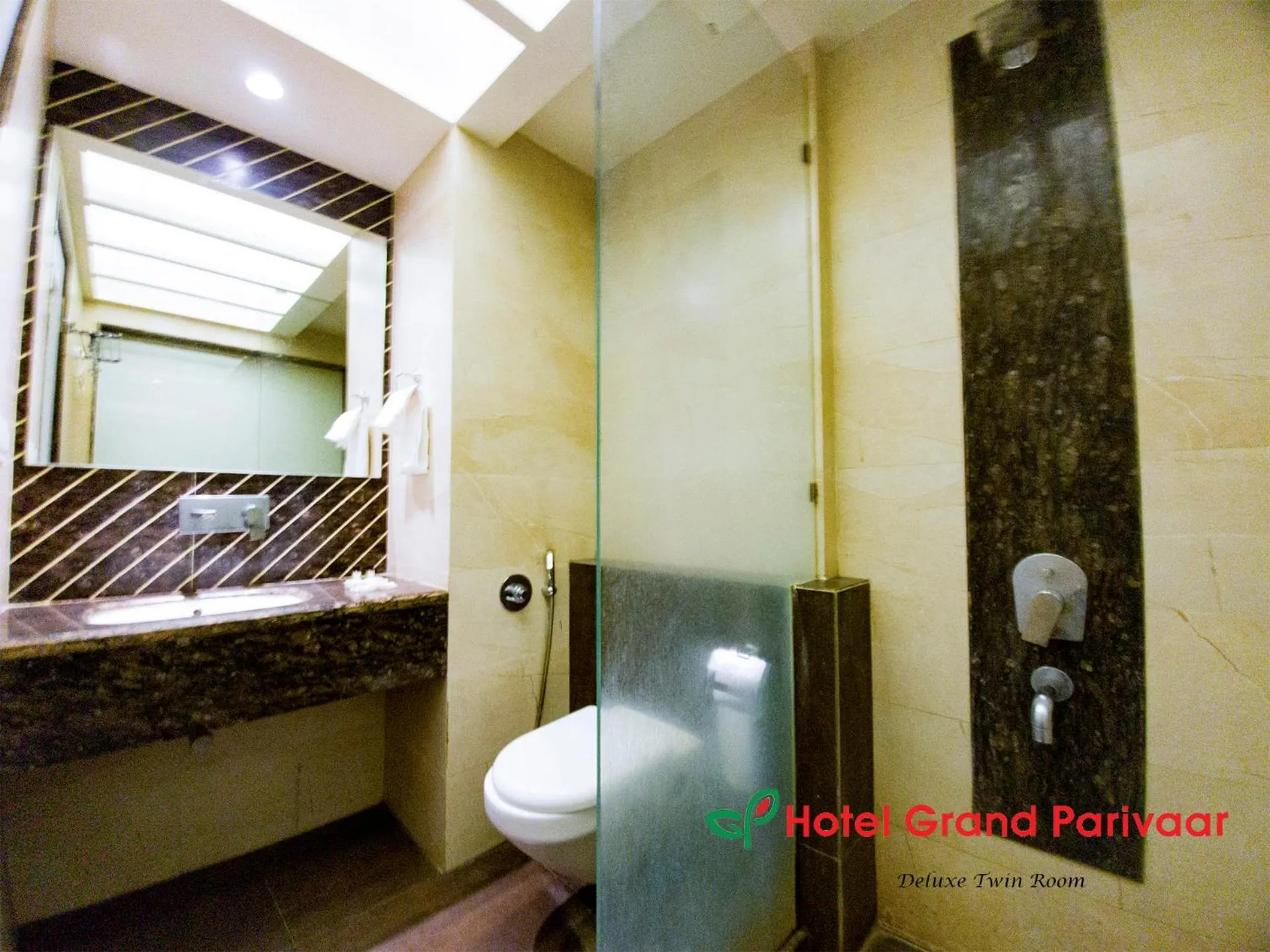 Bathroom in Hotel Grand Parivaar