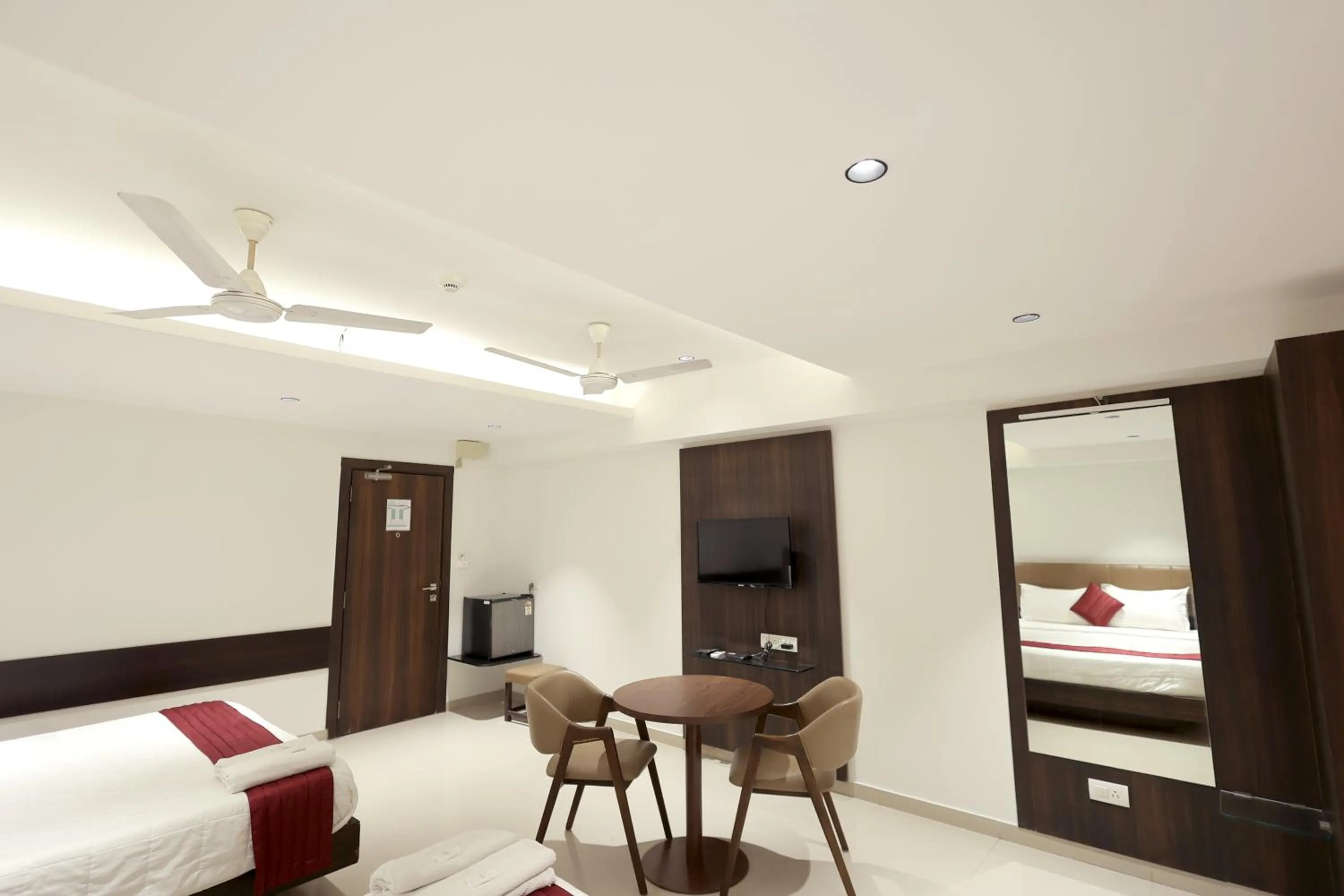 Photo of the whole room in Hotel Shagun, Piplod City Centre Surat