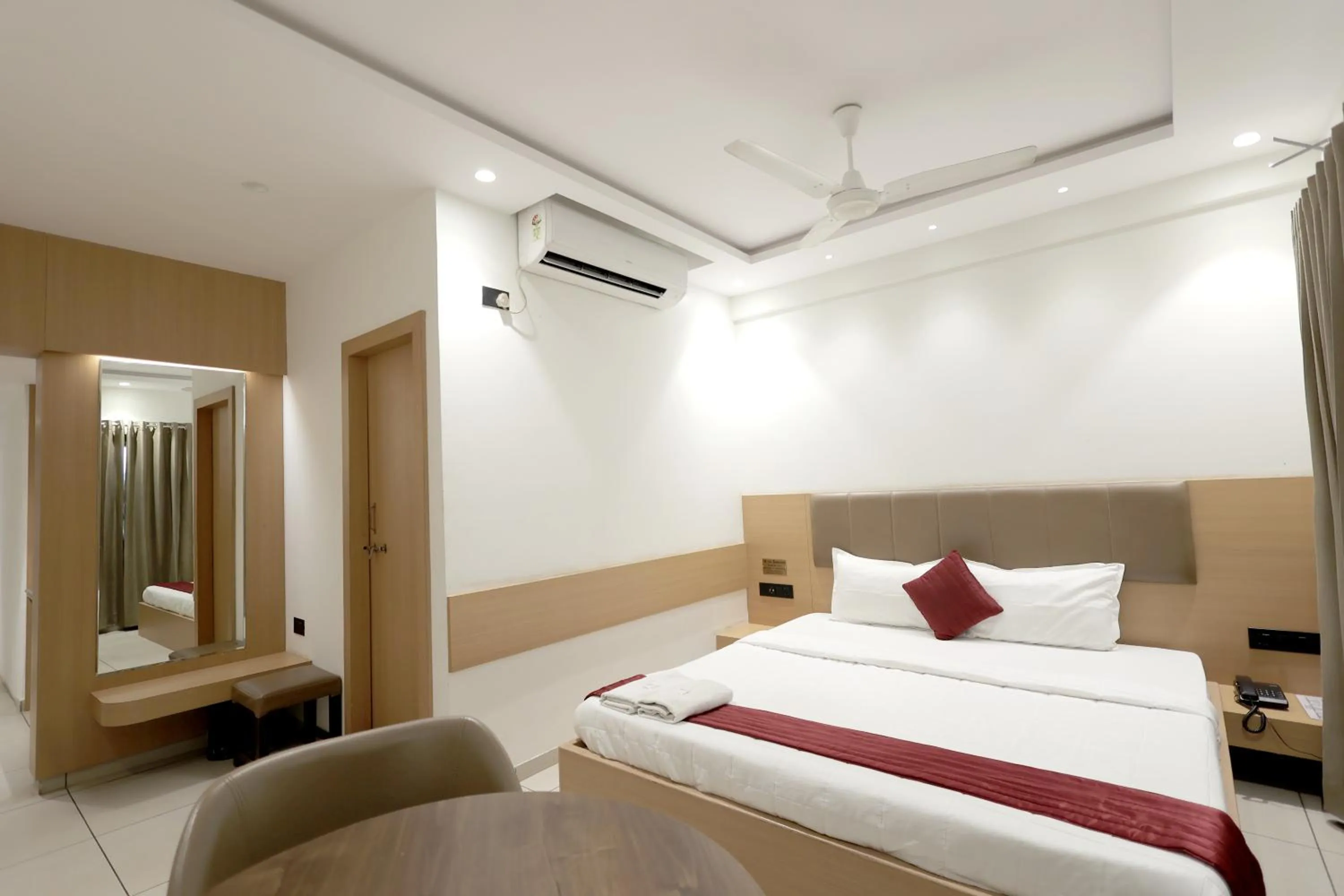 Bedroom in Hotel Shagun, Piplod City Centre Surat