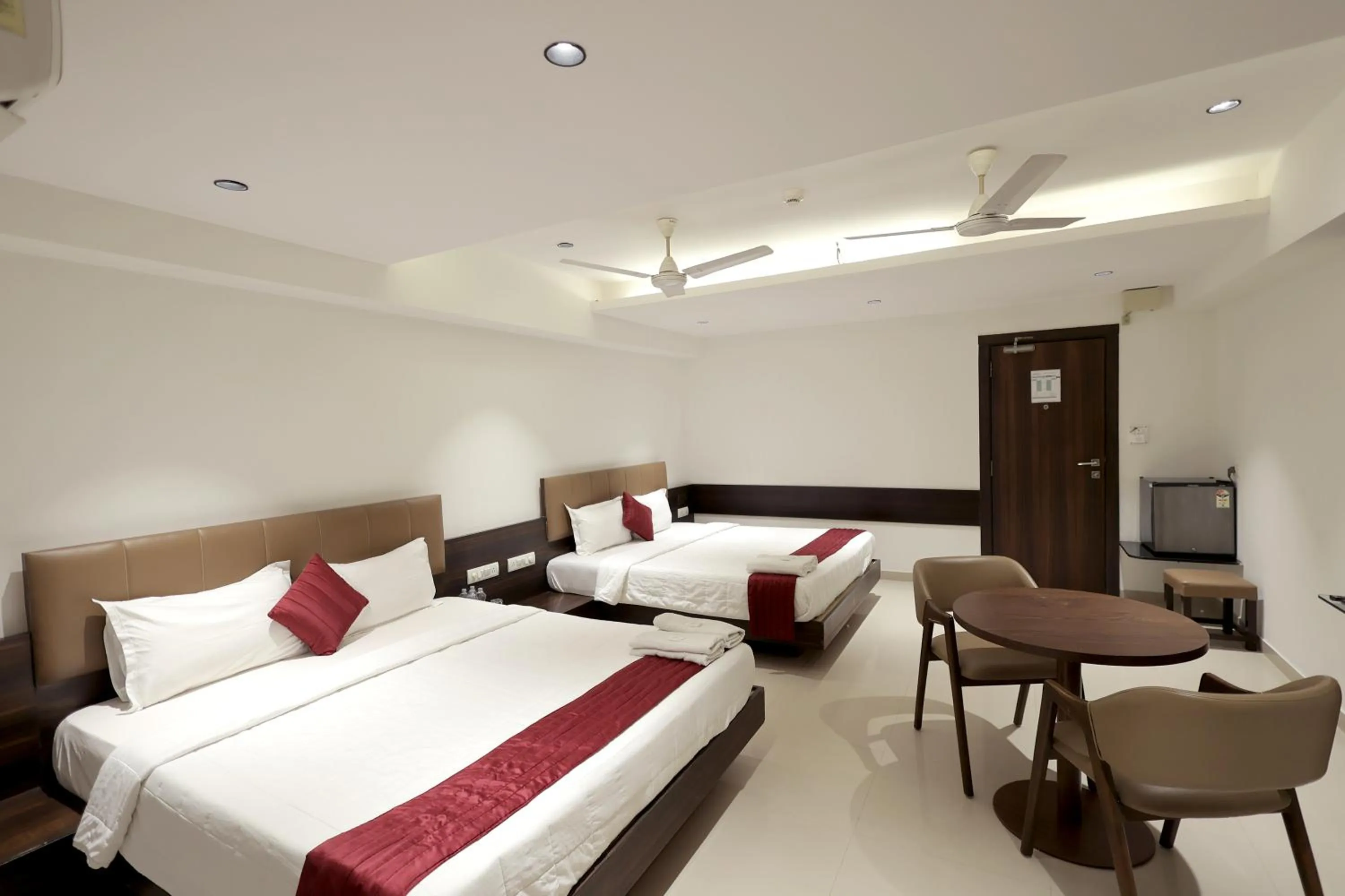 Bedroom in Hotel Shagun, Piplod City Centre Surat