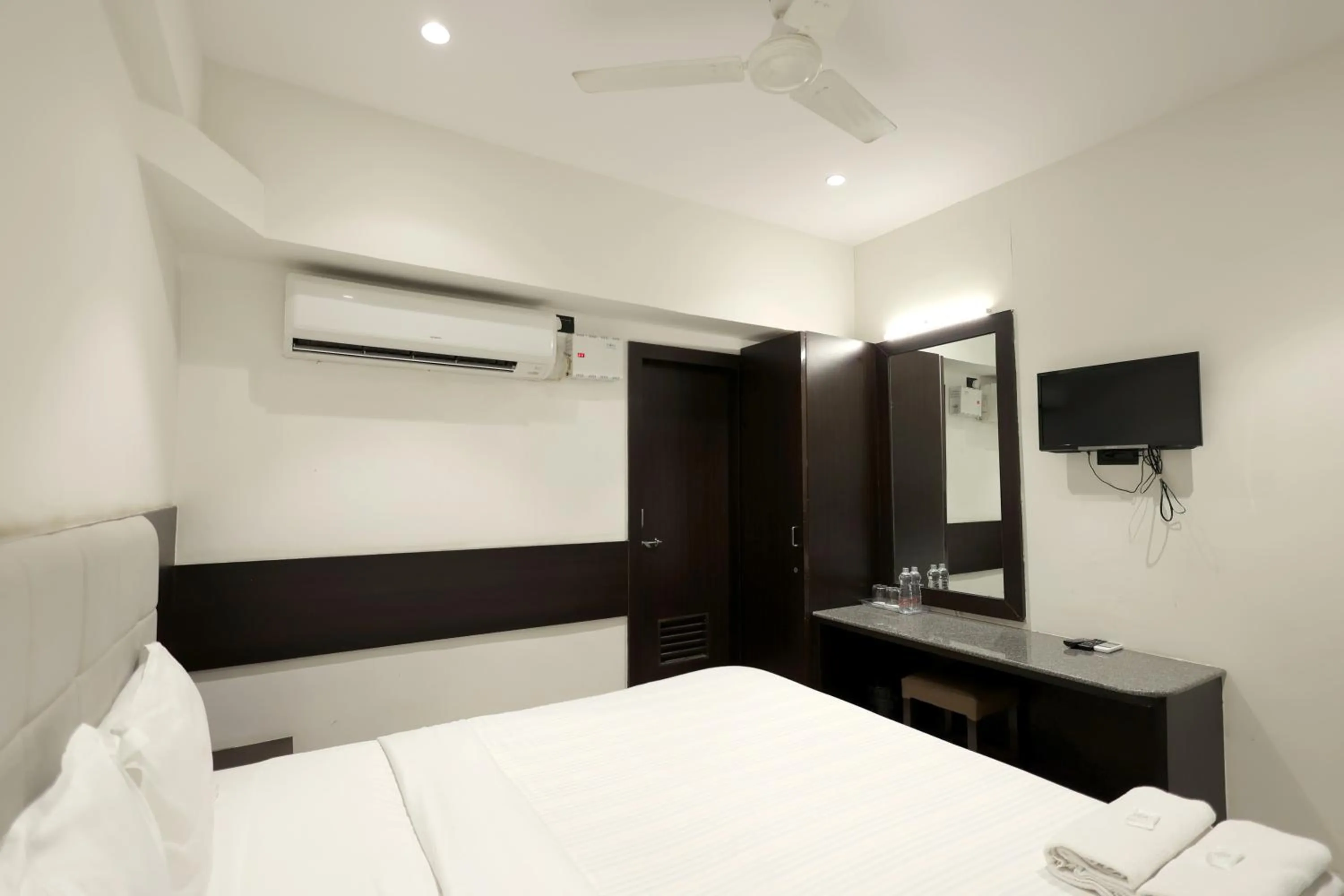 Bedroom in Hotel Shagun, Piplod City Centre Surat