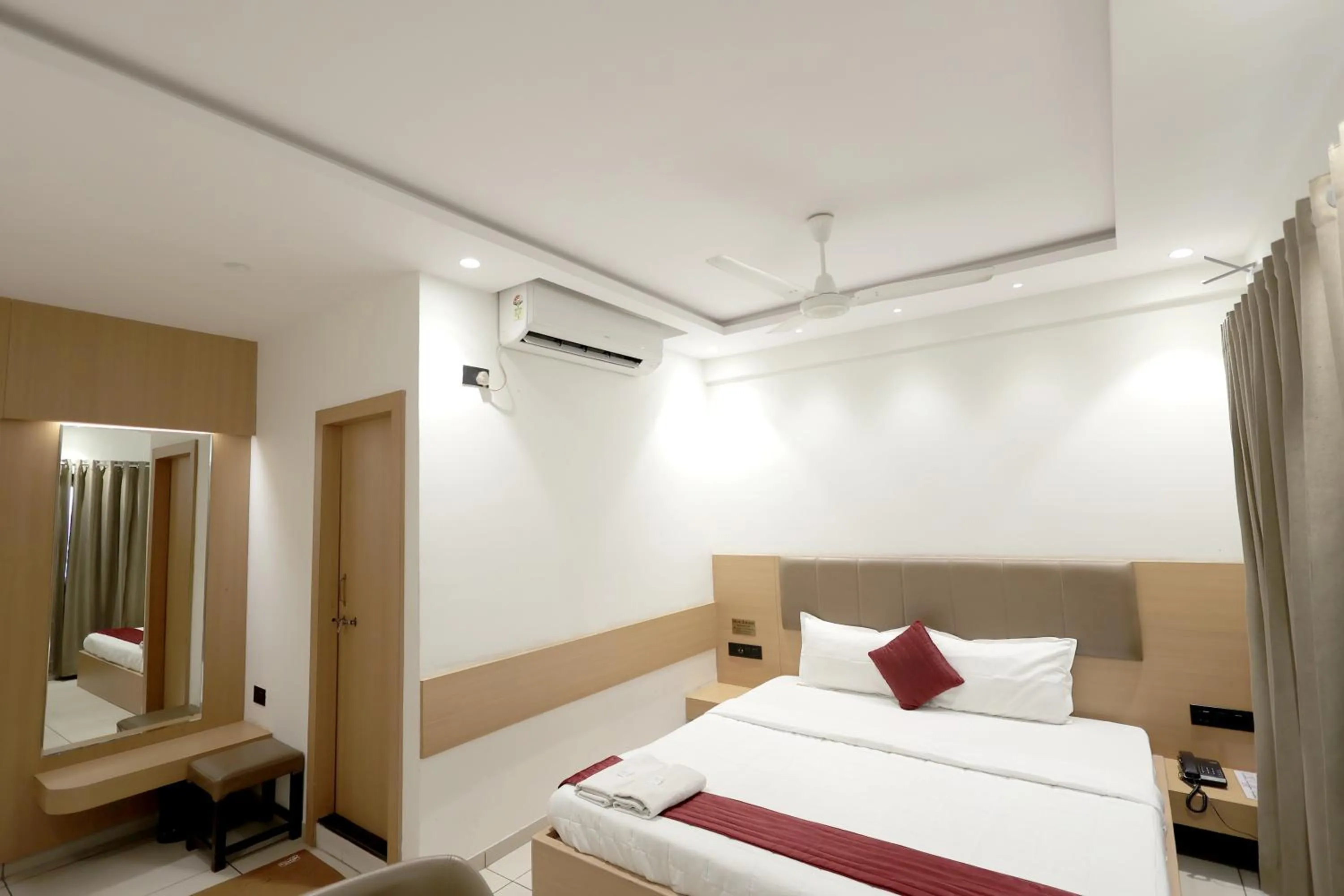 Bedroom in Hotel Shagun, Piplod City Centre Surat