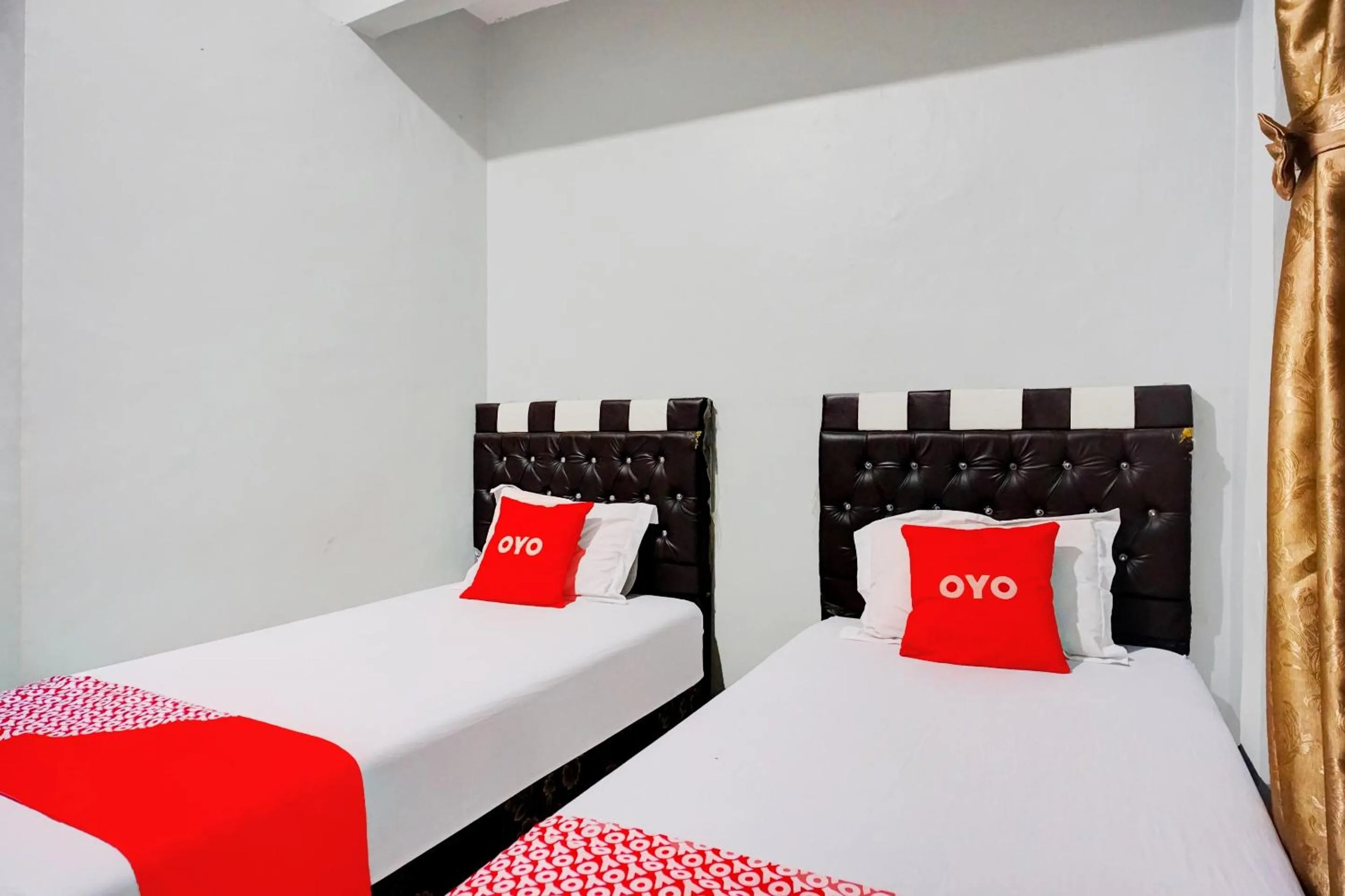 Bedroom in Hotel O Home Stay Kembar Syariah