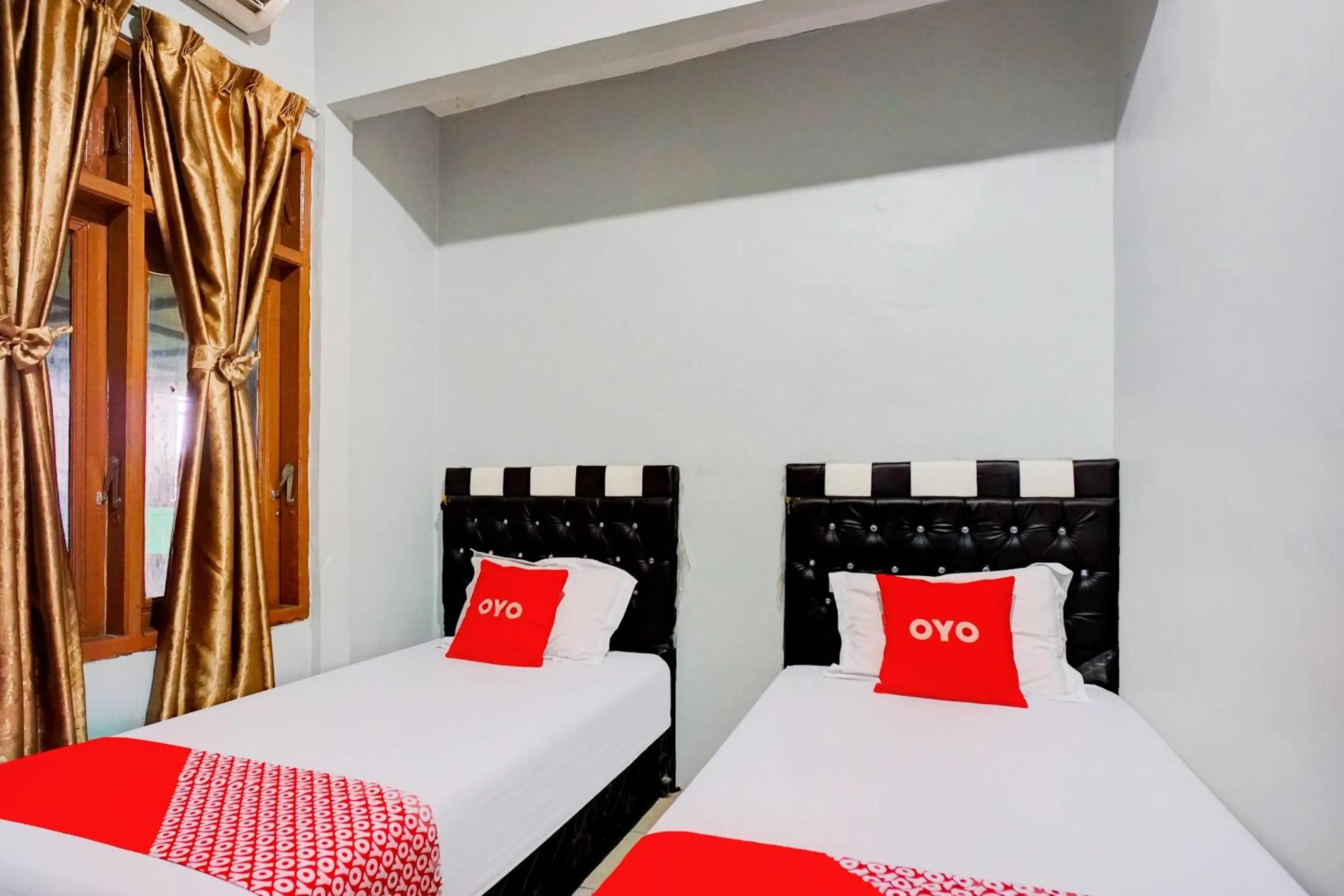 Bedroom in Hotel O Home Stay Kembar Syariah
