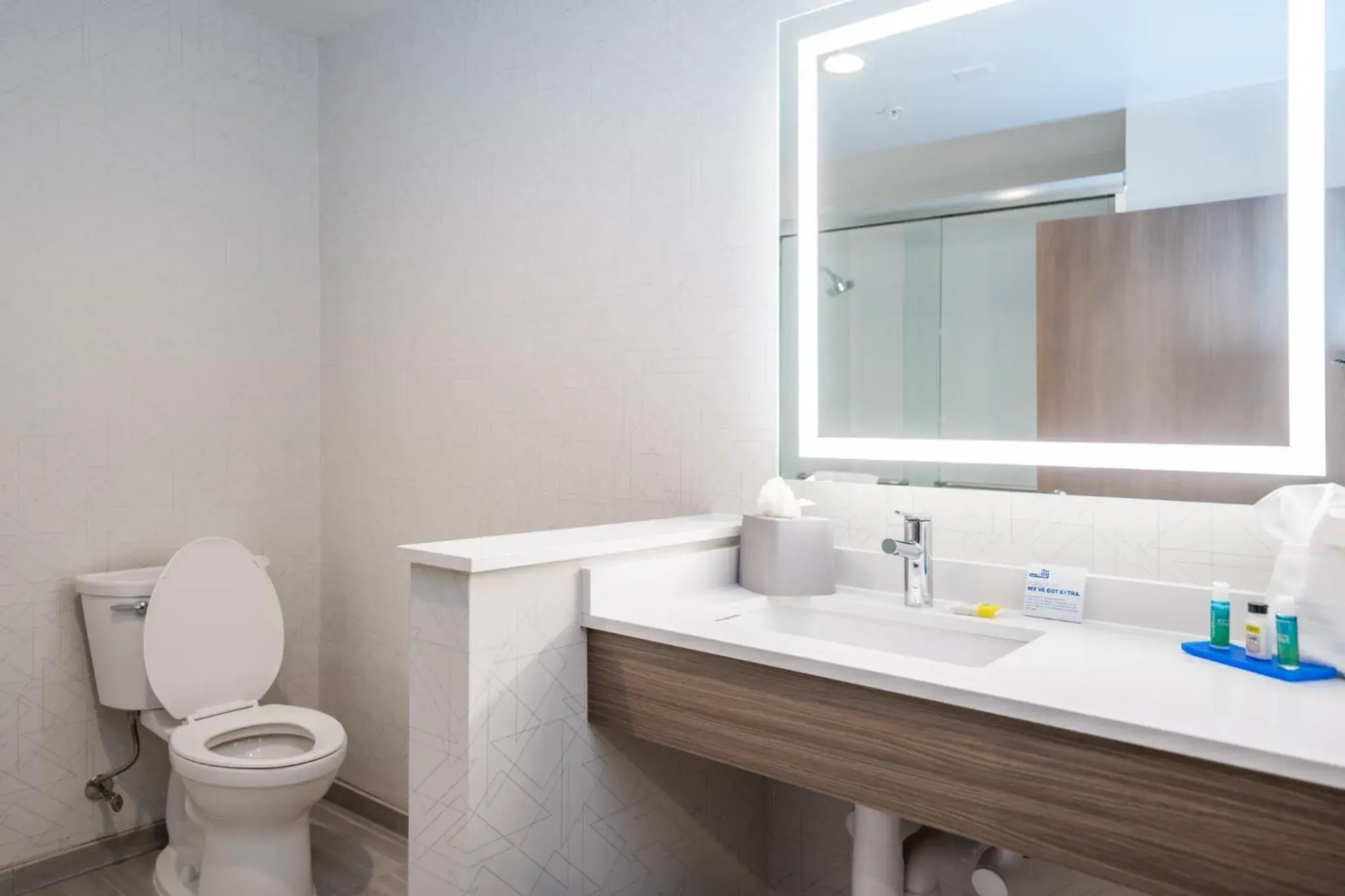 Bathroom in Holiday Inn Express & Suites Charlottesville by IHG Bathroom in Holiday Inn Express & Suites Charlottesville by IHG