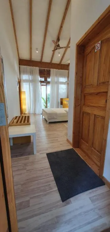 Bed in Origami Inn Himandhoo