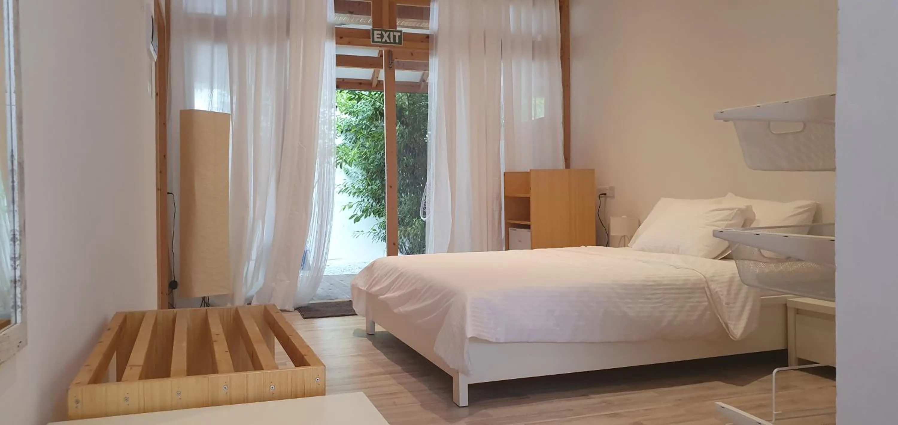 Bed in Origami Inn Himandhoo