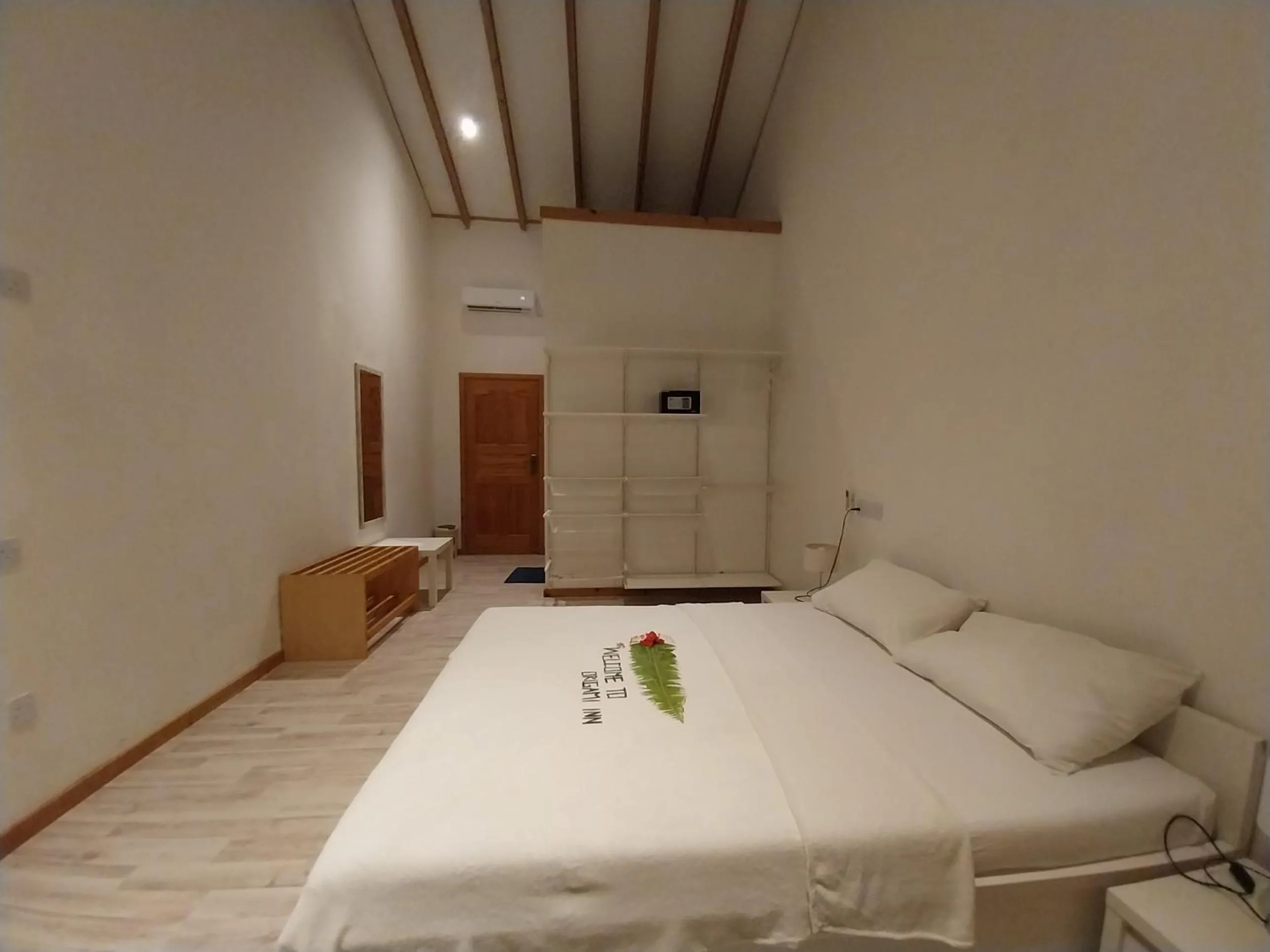 Bed in Origami Inn Himandhoo