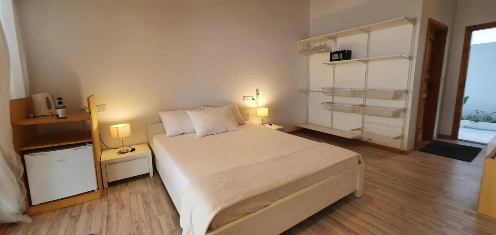 Bed in Origami Inn Himandhoo