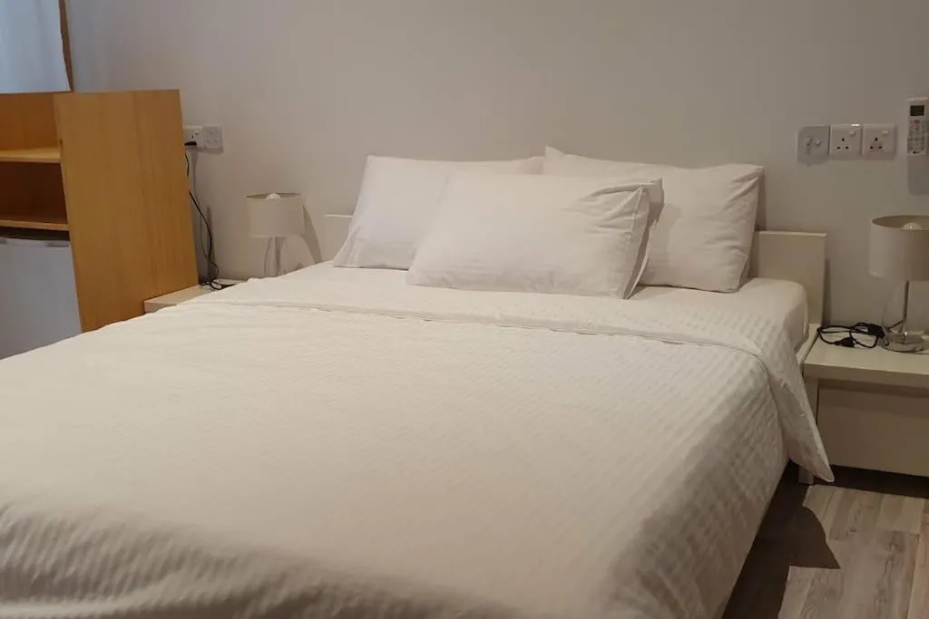 Bed in Origami Inn Himandhoo