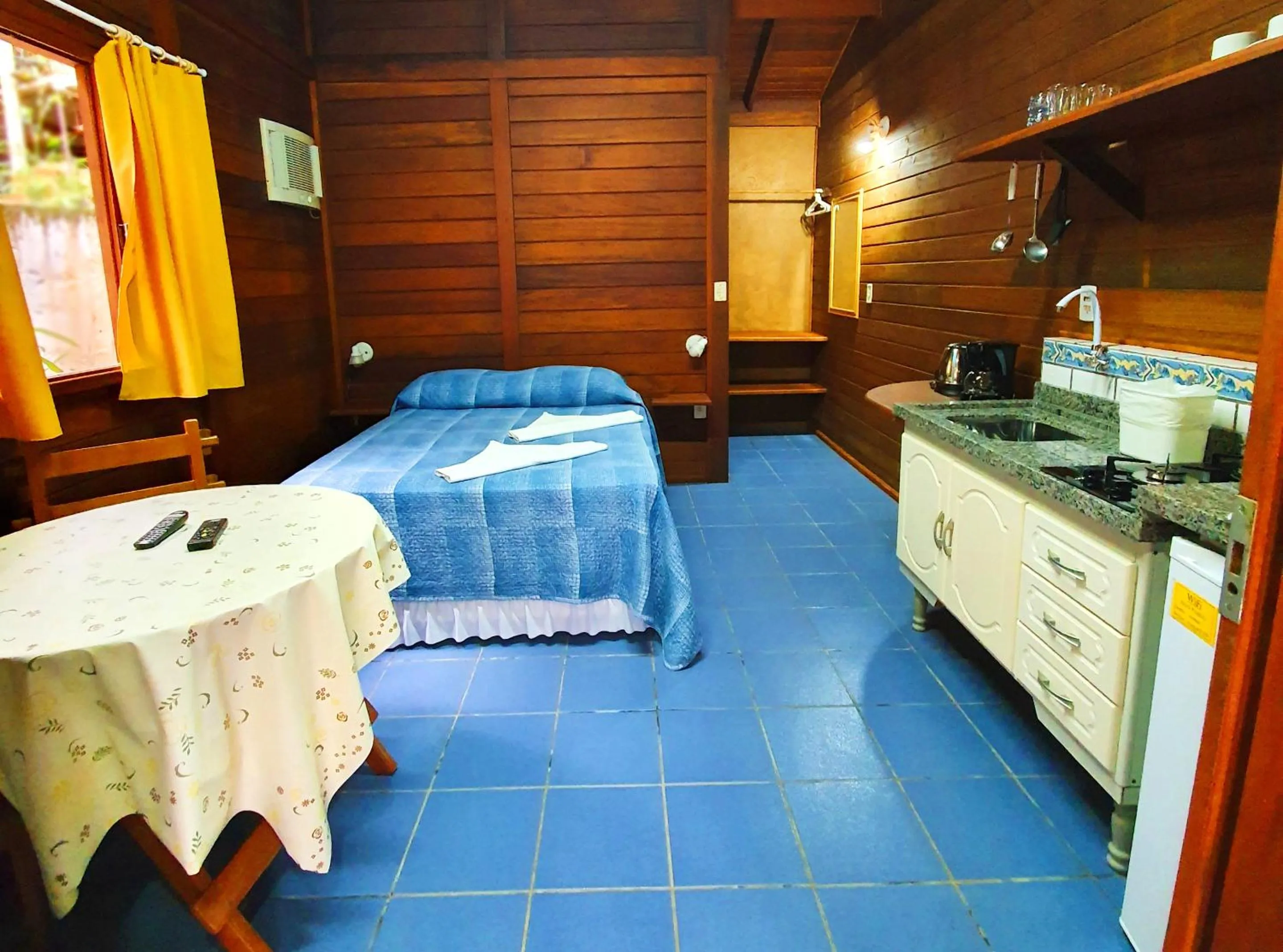 Kitchen or kitchenette, Bed in Pousada Don Pablo
