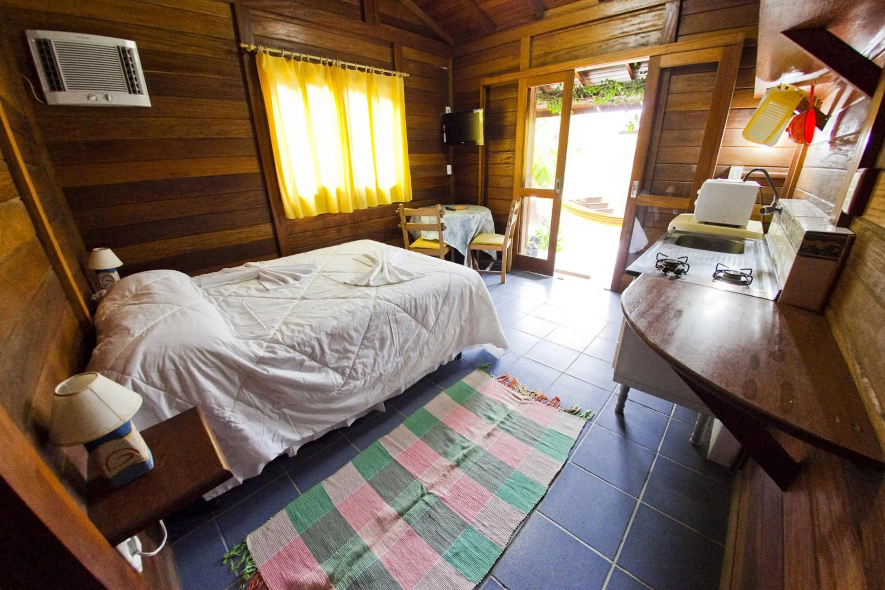 Kitchen or kitchenette, Bed in Pousada Don Pablo