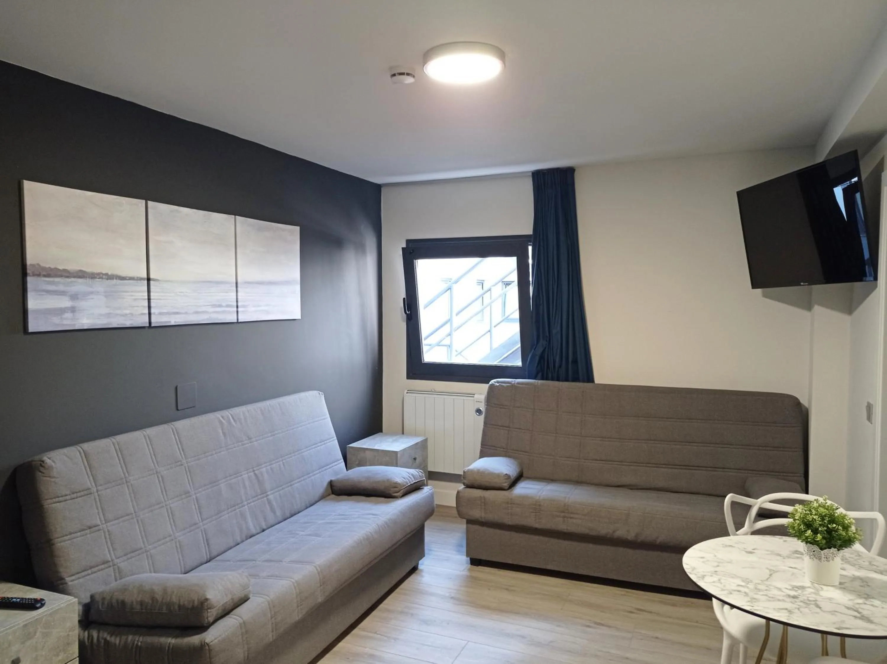 Living room in Apartamentos Hi Apartaments Santander 3000