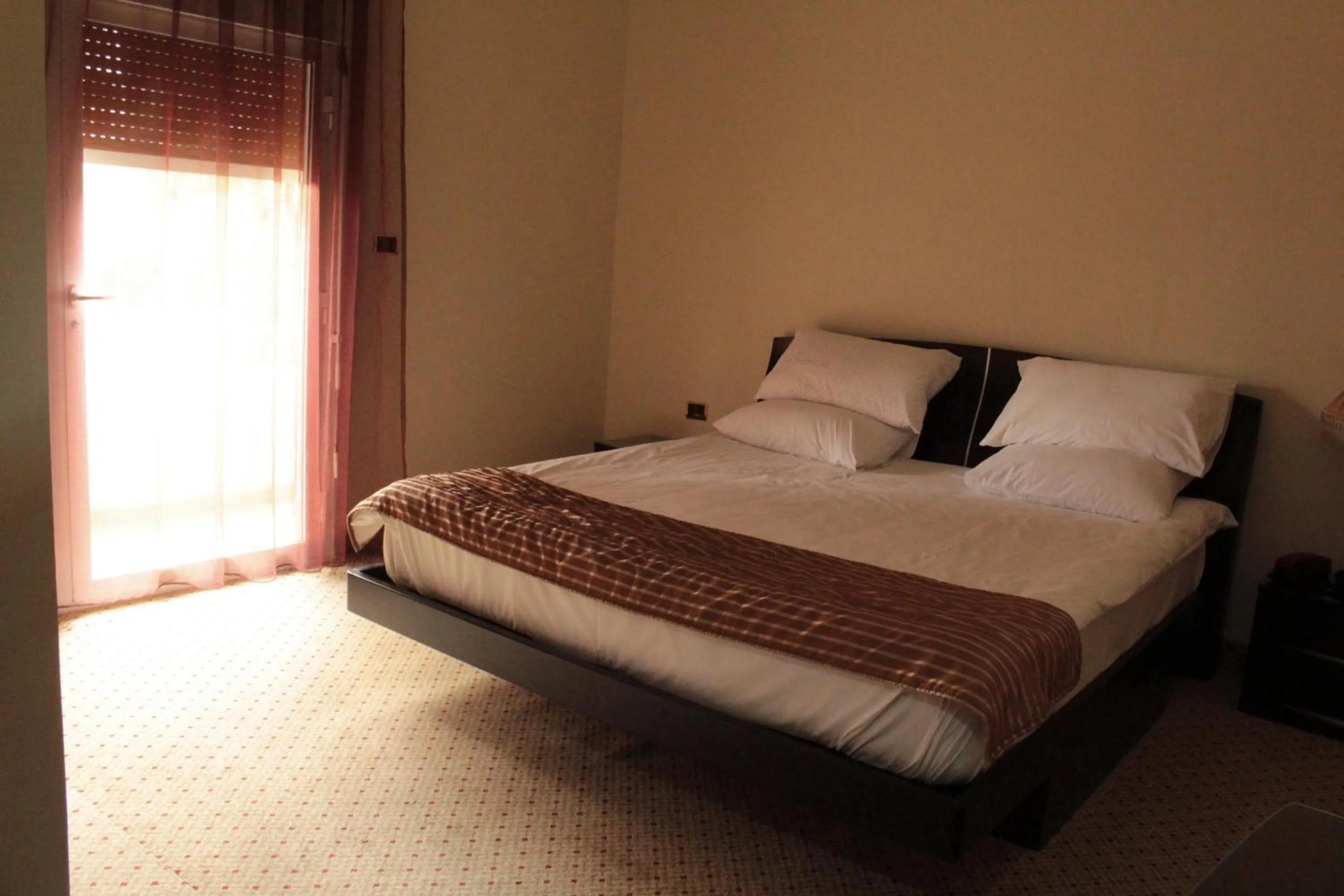 Bed in Colibri Hotel