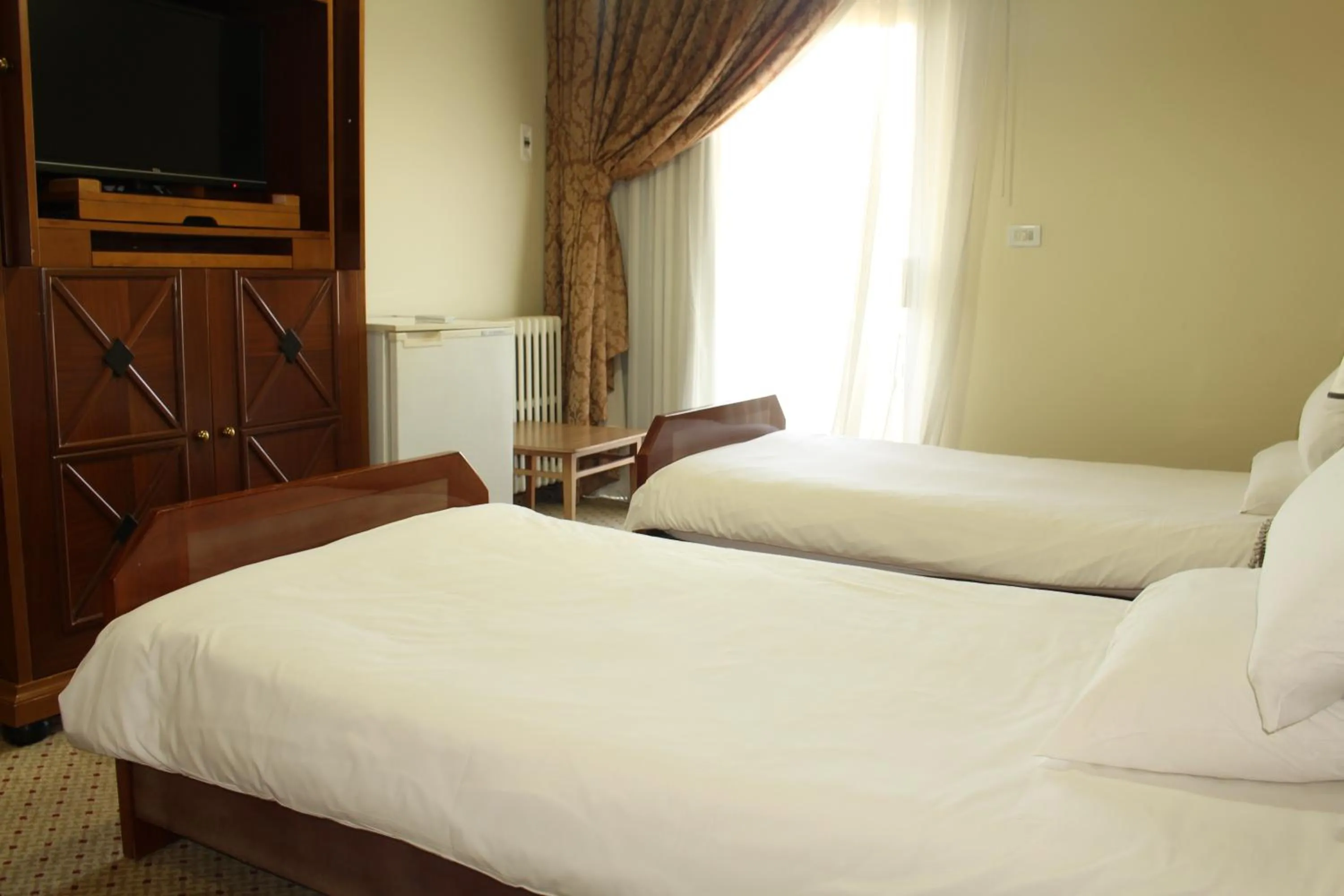 Bed in Colibri Hotel