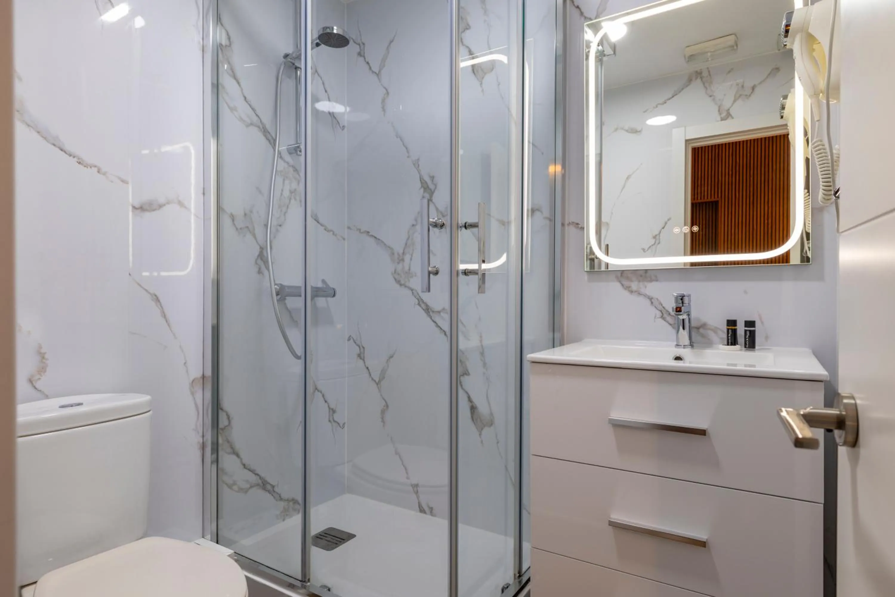 Bathroom in H-A San Mateo Suites