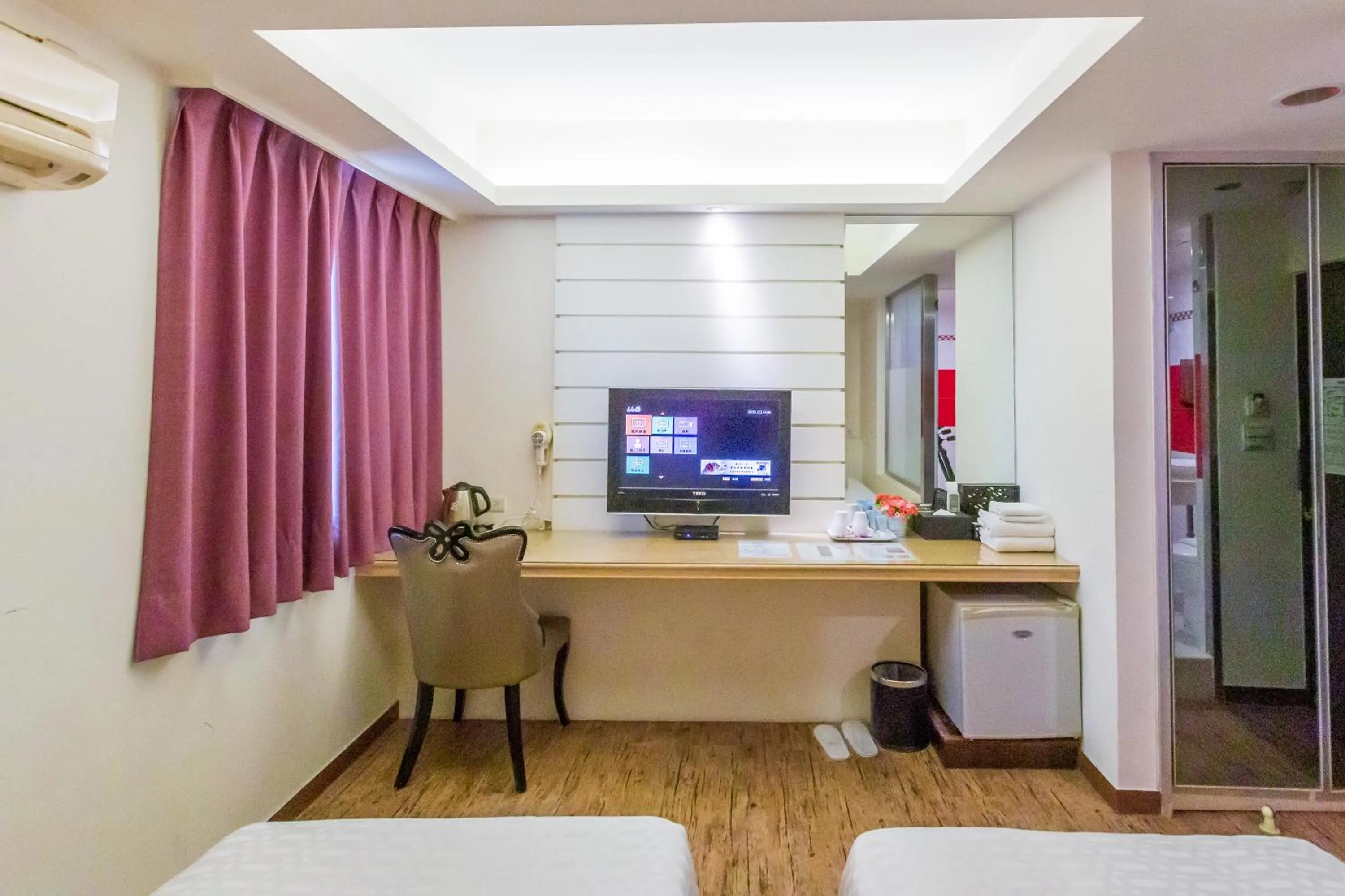 Photo of the whole room in Newrise Hotel