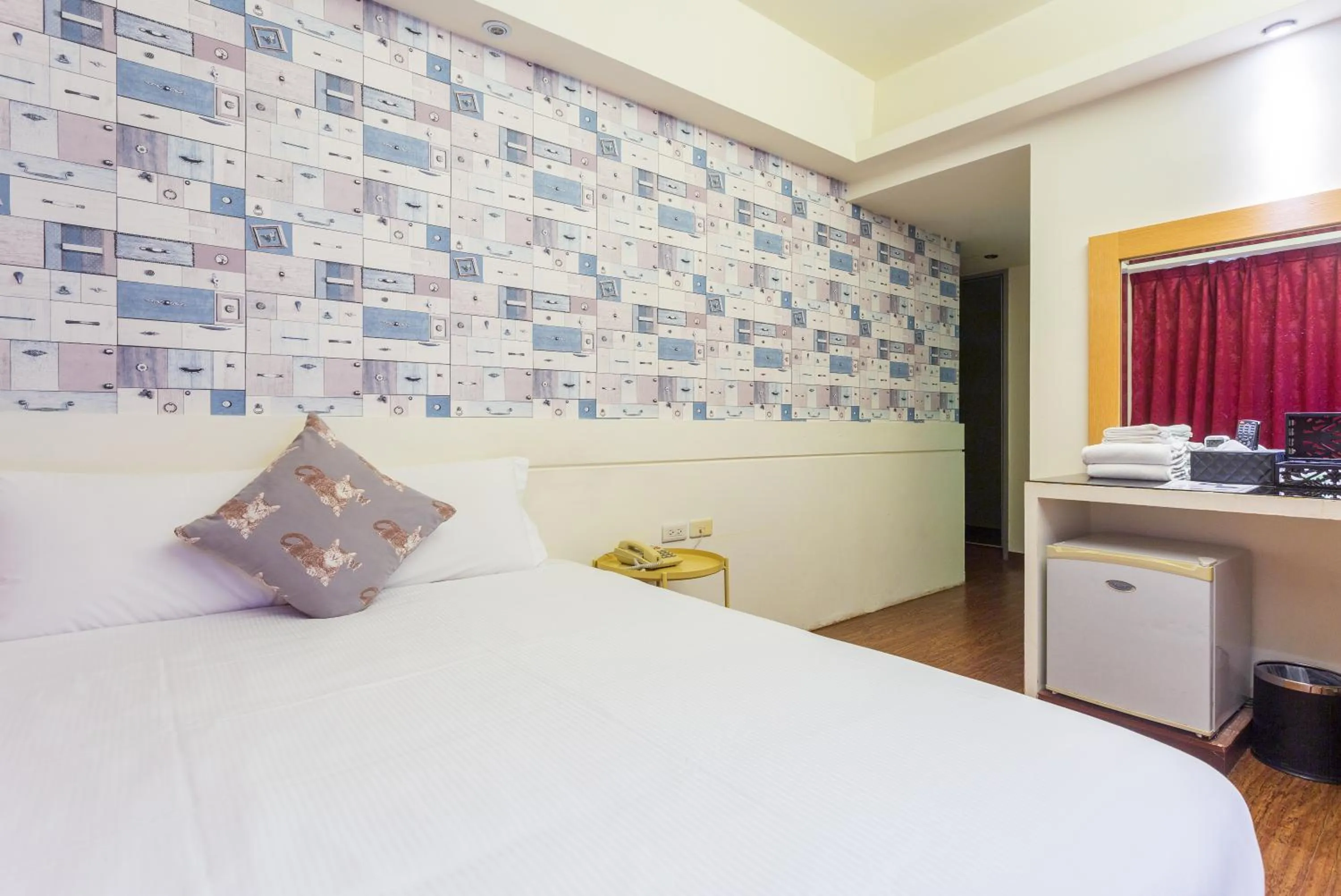 Bed in Newrise Hotel