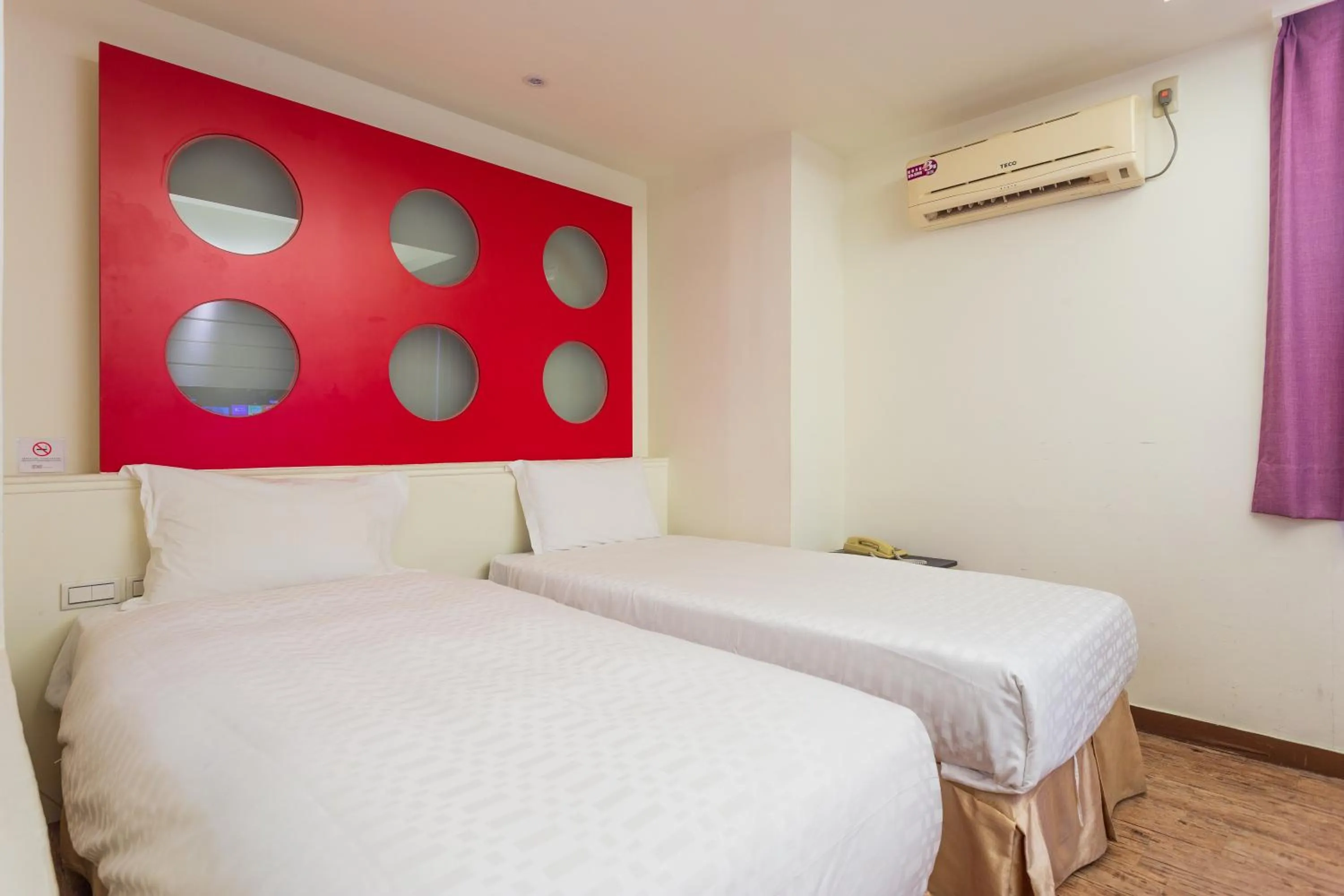 Photo of the whole room, Bed in Newrise Hotel