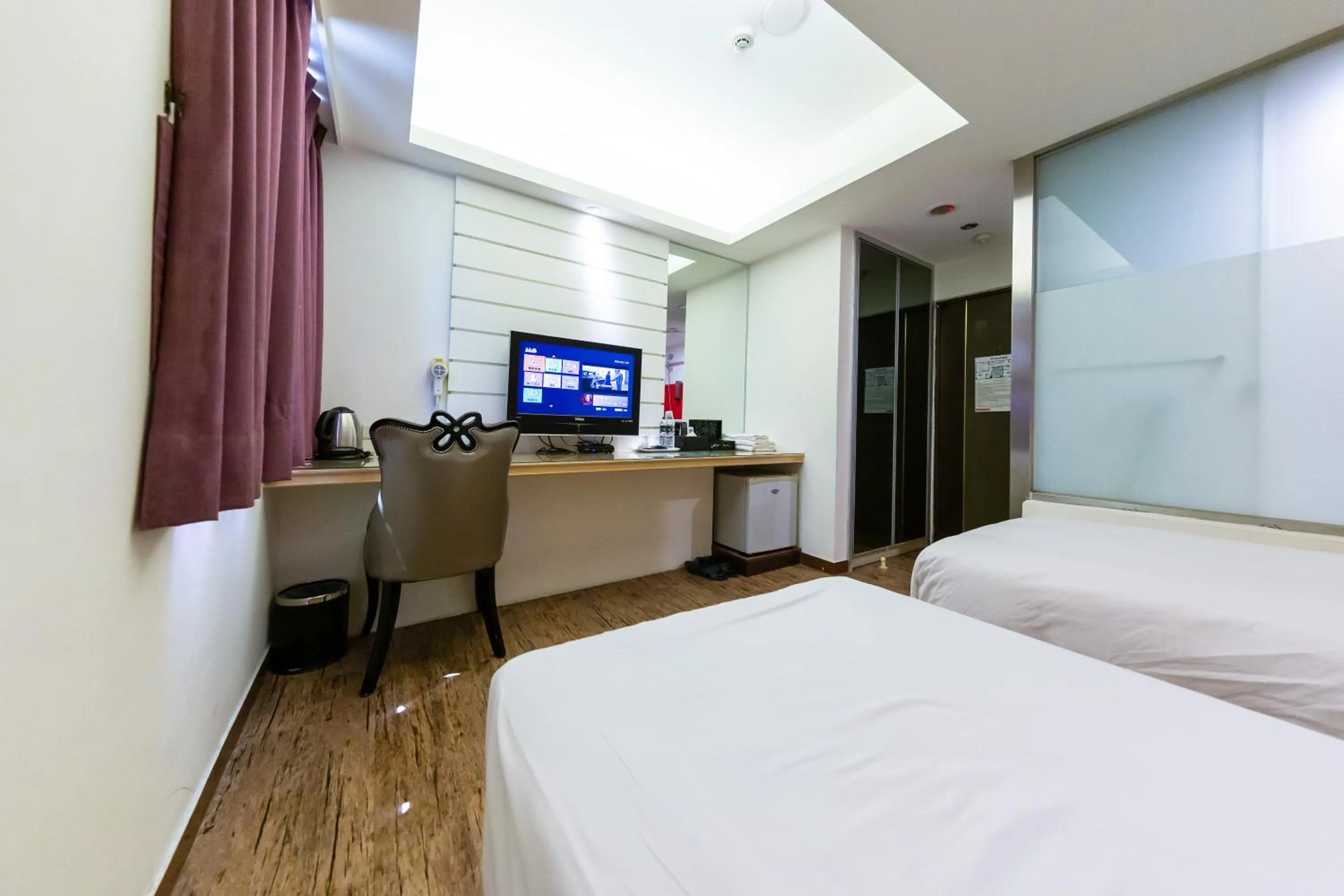 Bed in Newrise Hotel