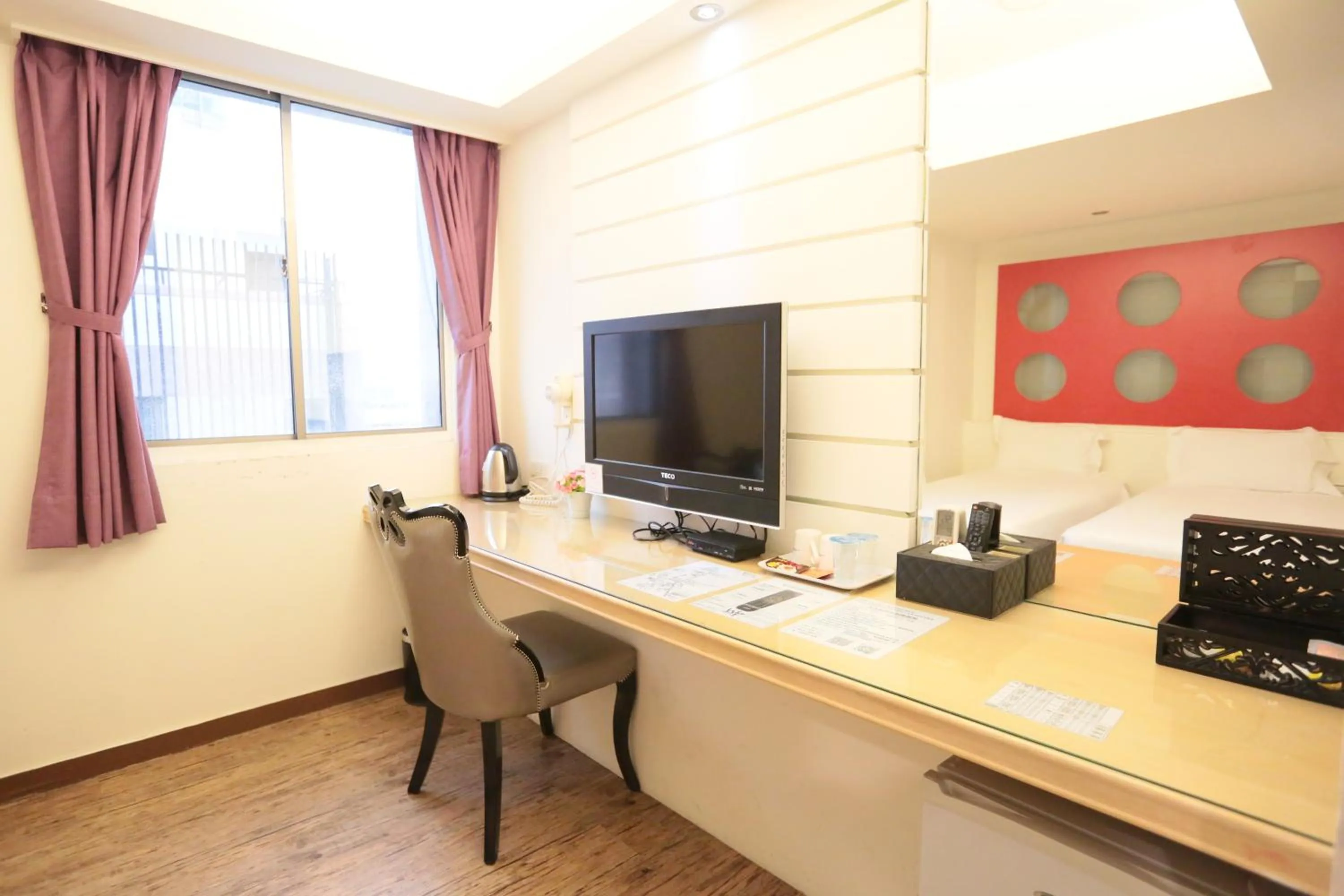 Photo of the whole room in Newrise Hotel