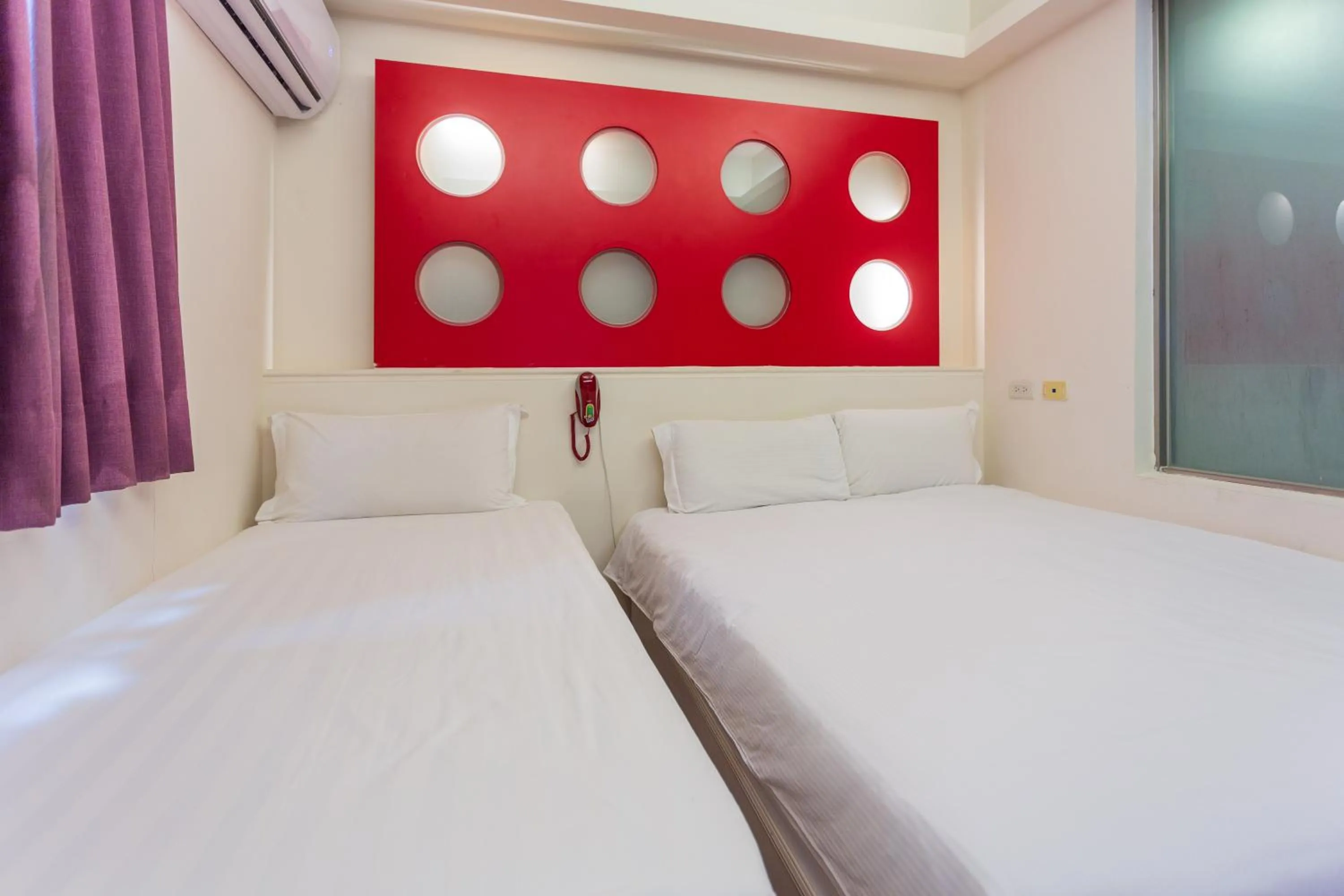 Photo of the whole room, Bed in Newrise Hotel