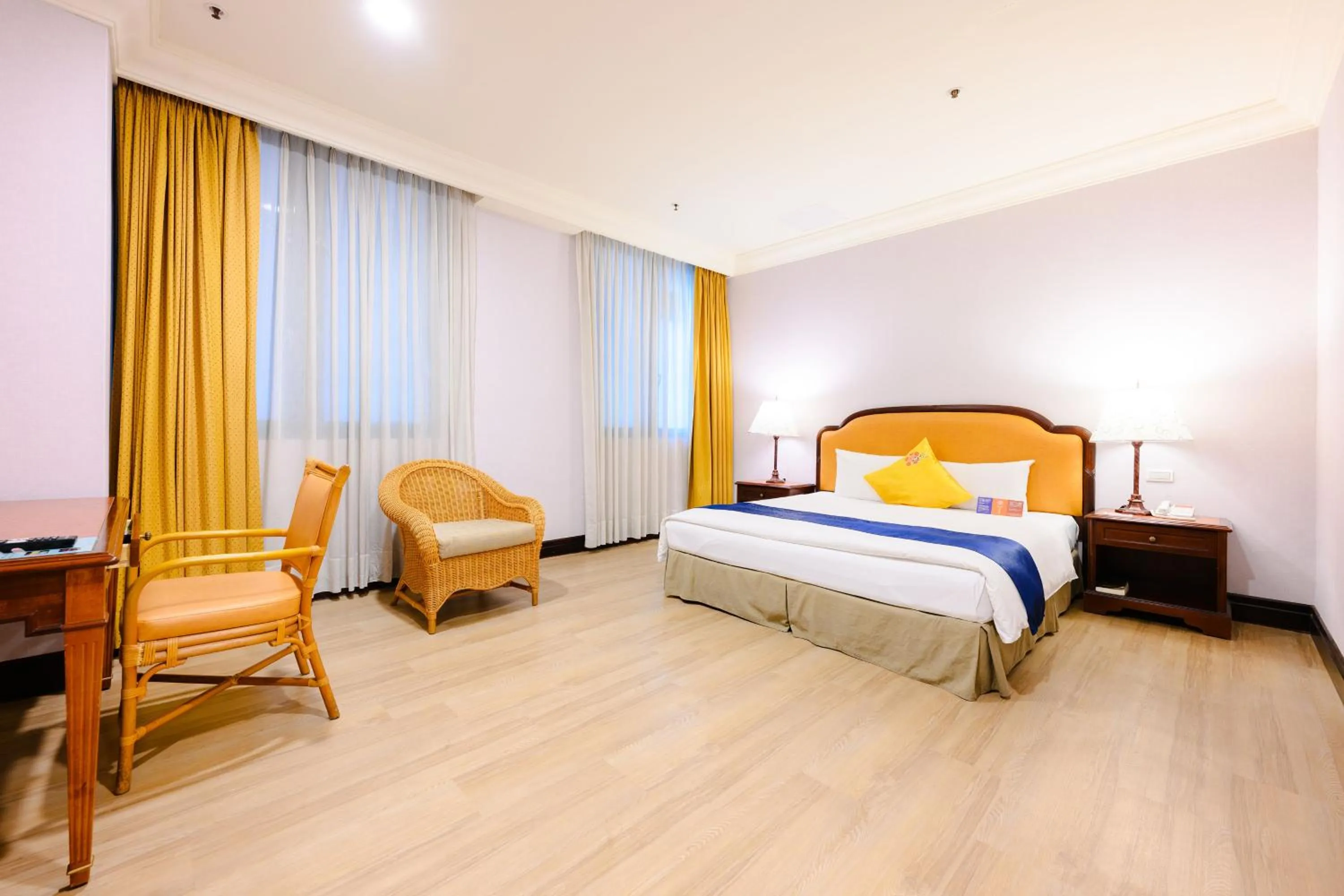 Photo of the whole room, Bed in Wei-Yat Grand Hotel