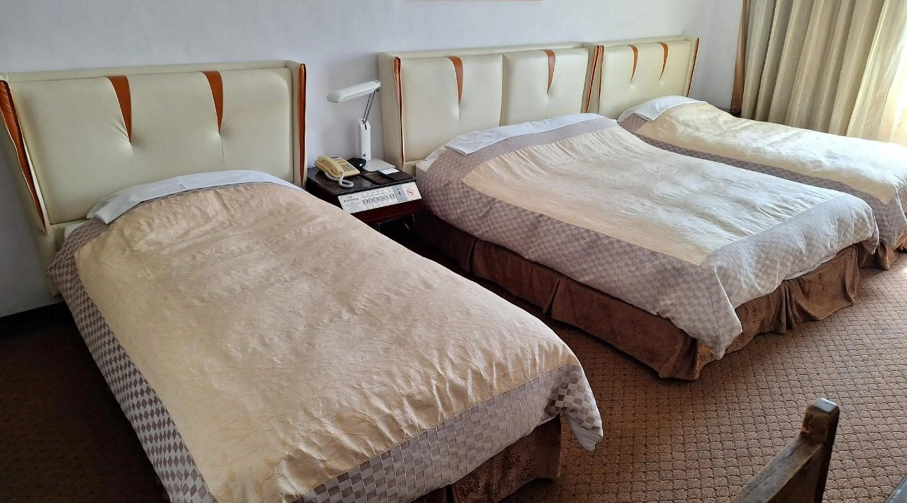 Bed in Kingship Hotel Kaohsiung Inter Continental