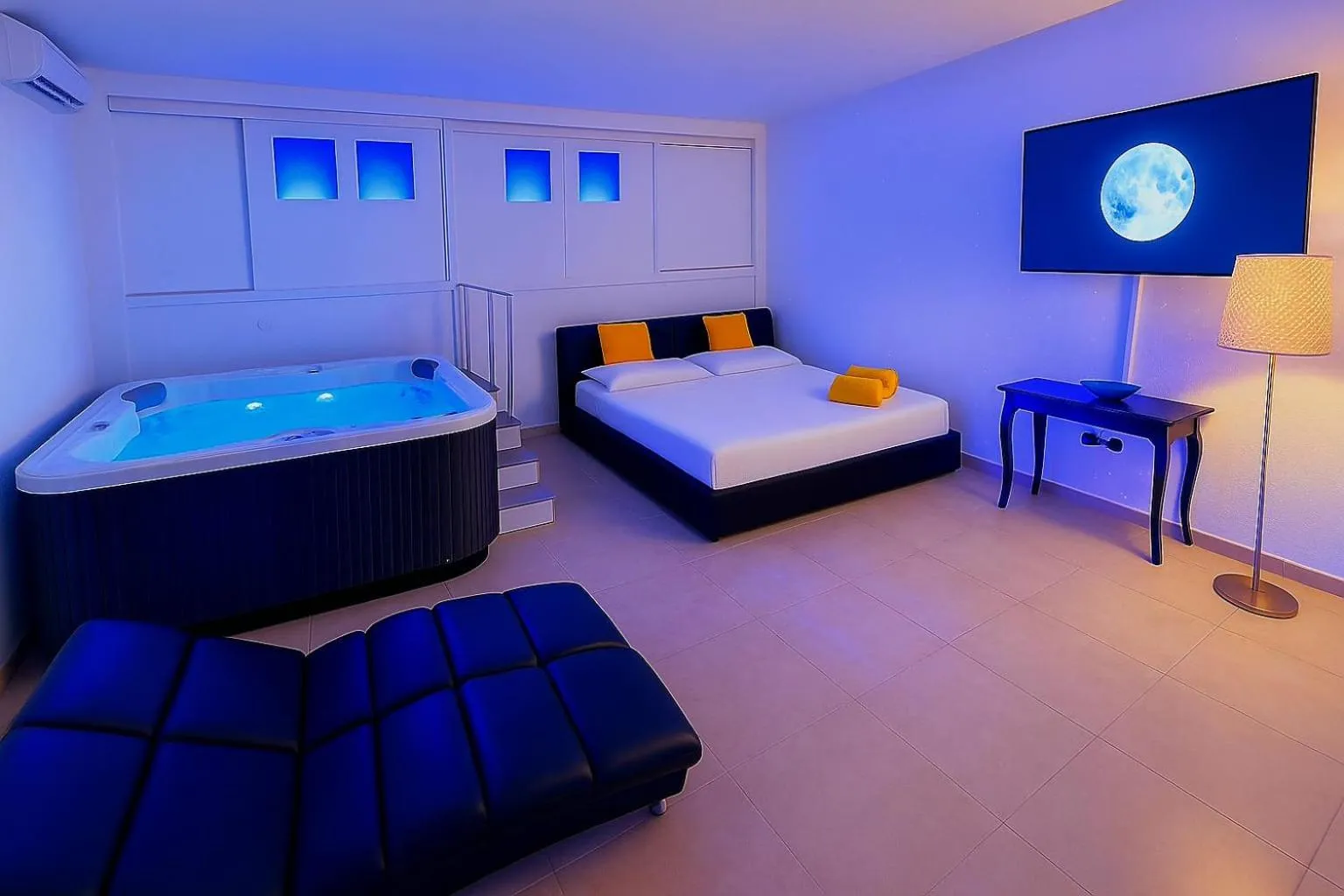 Bed in Alchimia Luxury Suites