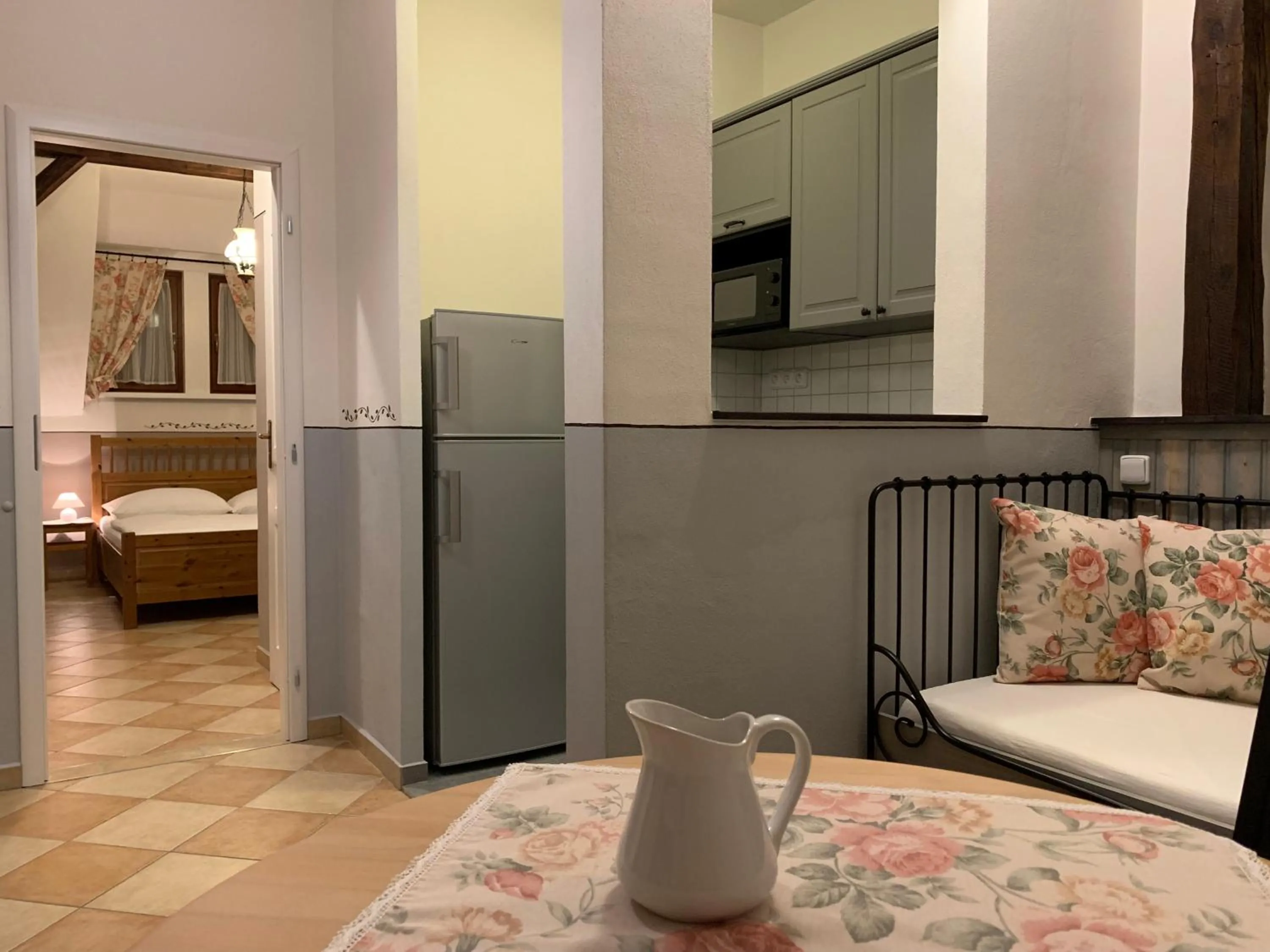 Living room, Bed in Pension Amadeus & Apartments