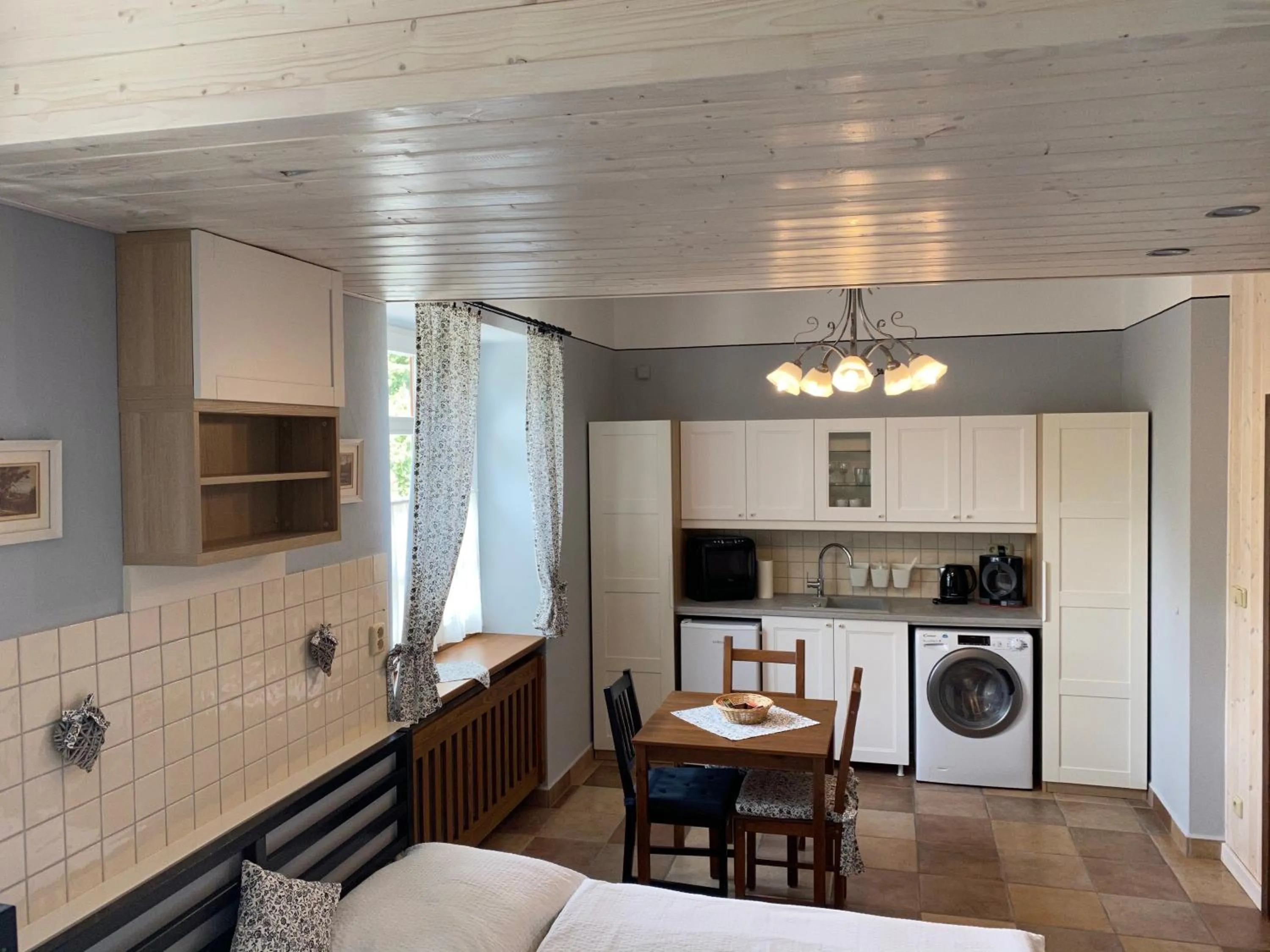 Kitchen or kitchenette in Pension Amadeus & Apartments