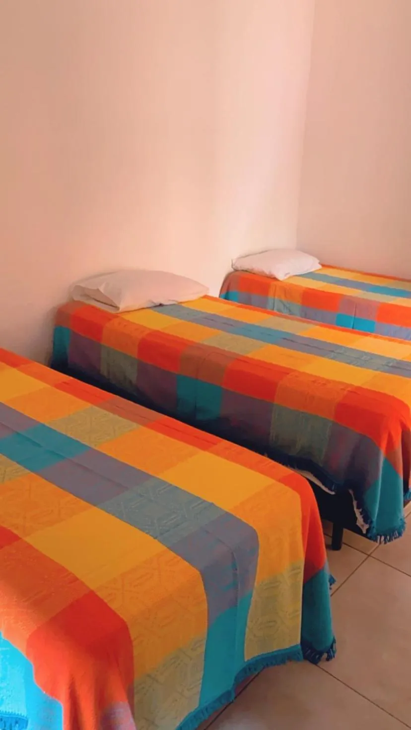 Bed in Hotel Pousada Ibituruna inn