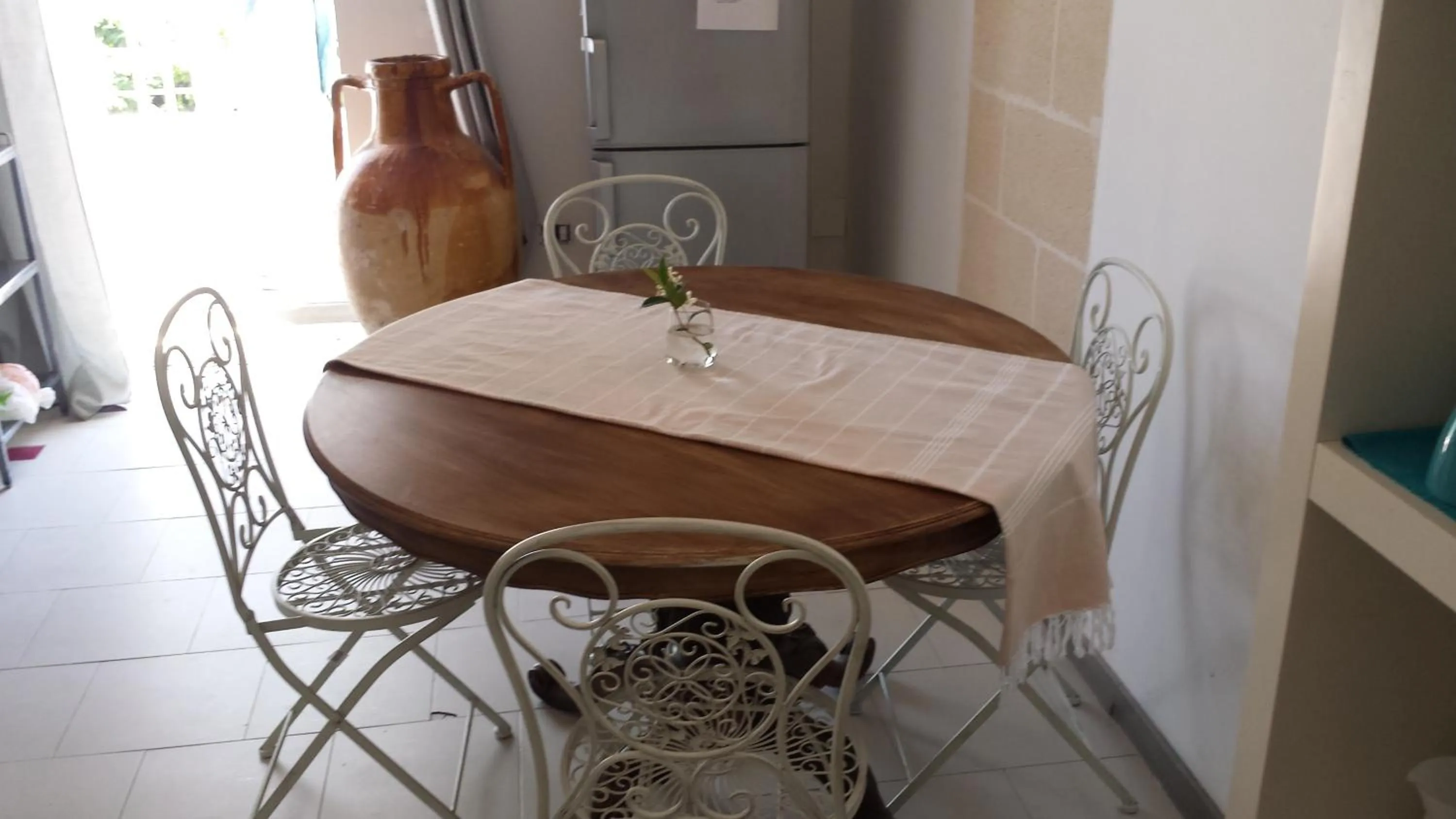 Kitchen or kitchenette in Aparthotel Masseria Villa Marchesi